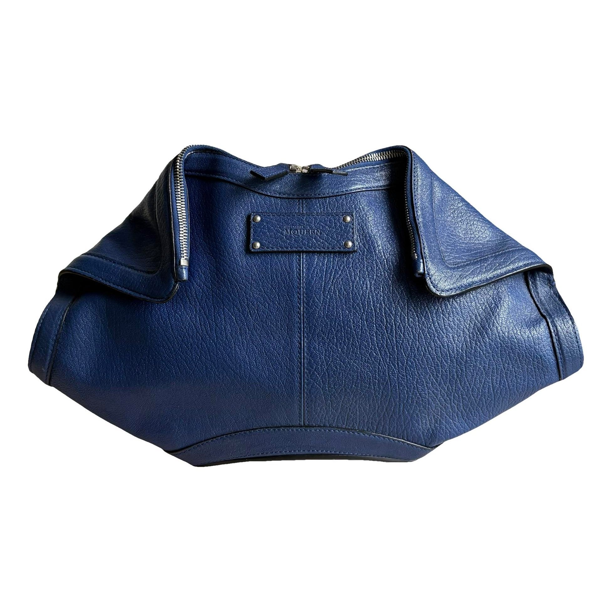 Manta leather clutch bag