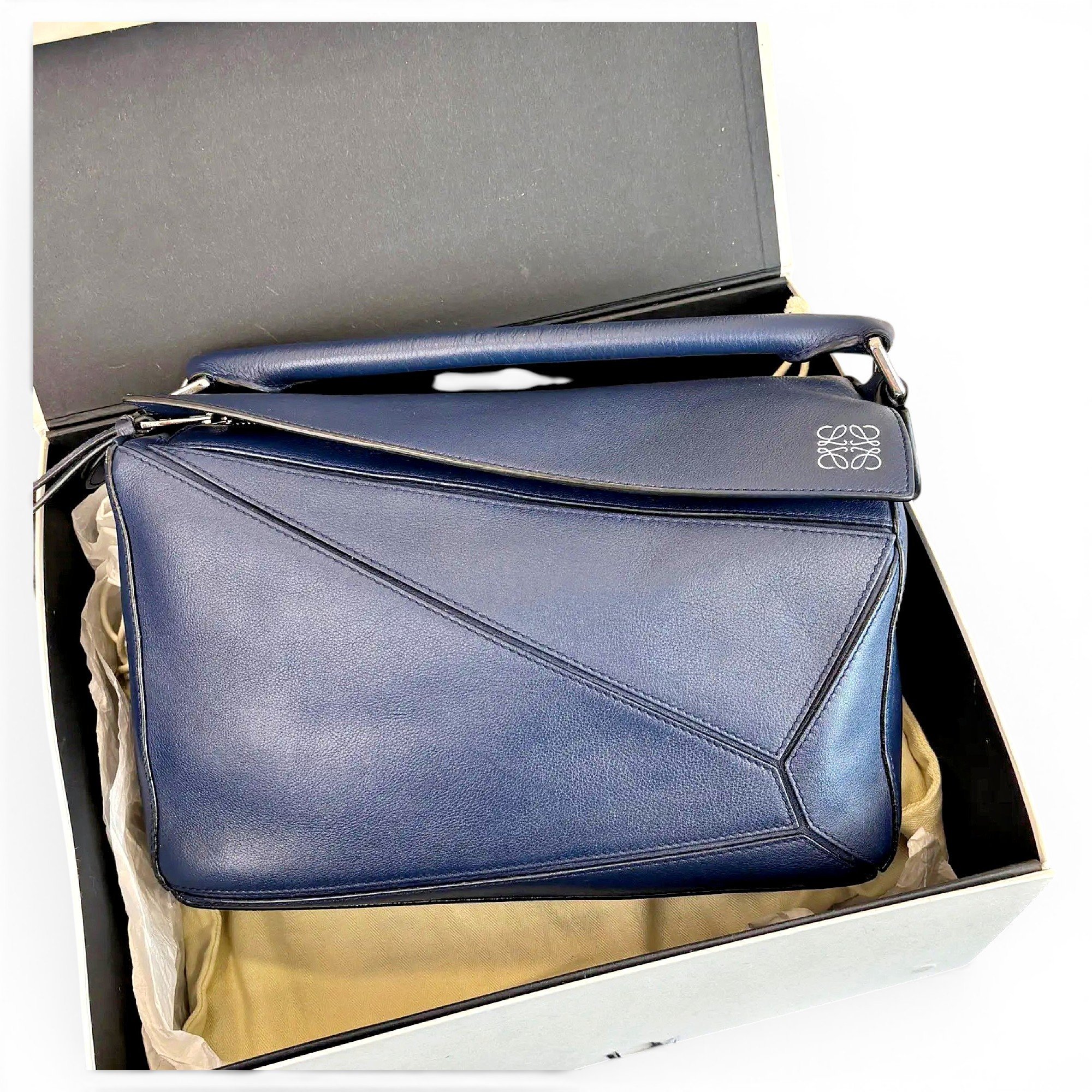Puzzle leather handbag