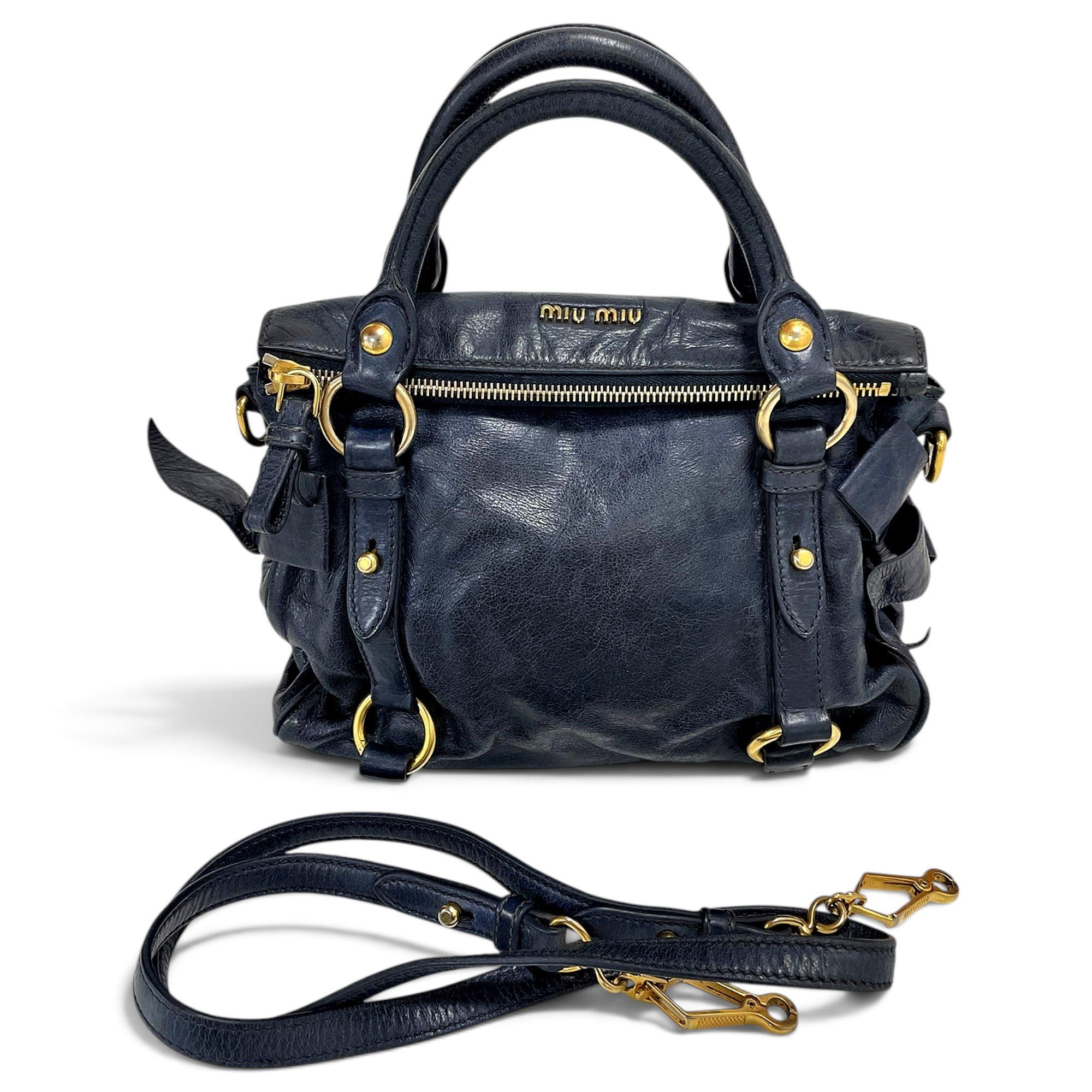 Bow bag leather handbag