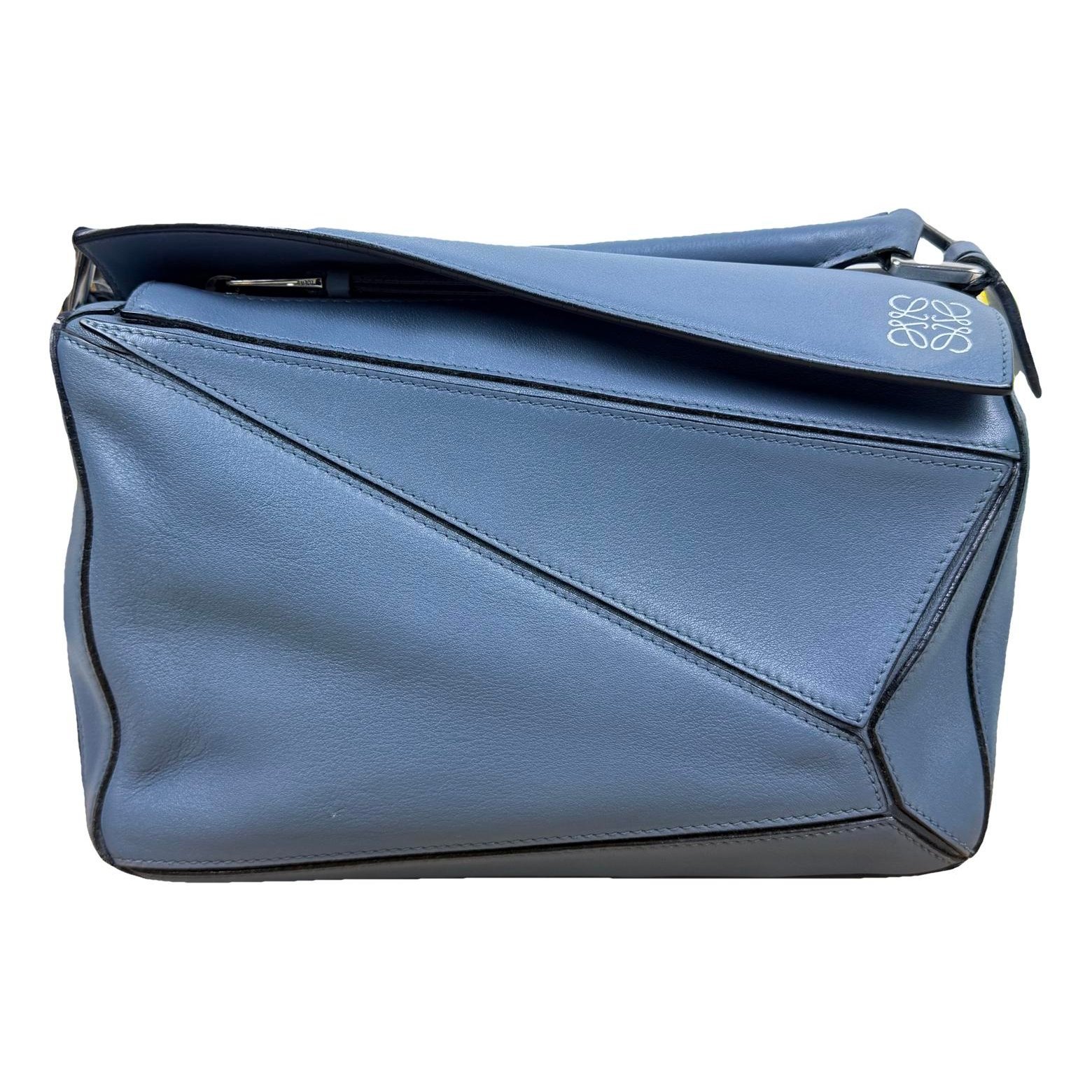Puzzle leather handbag