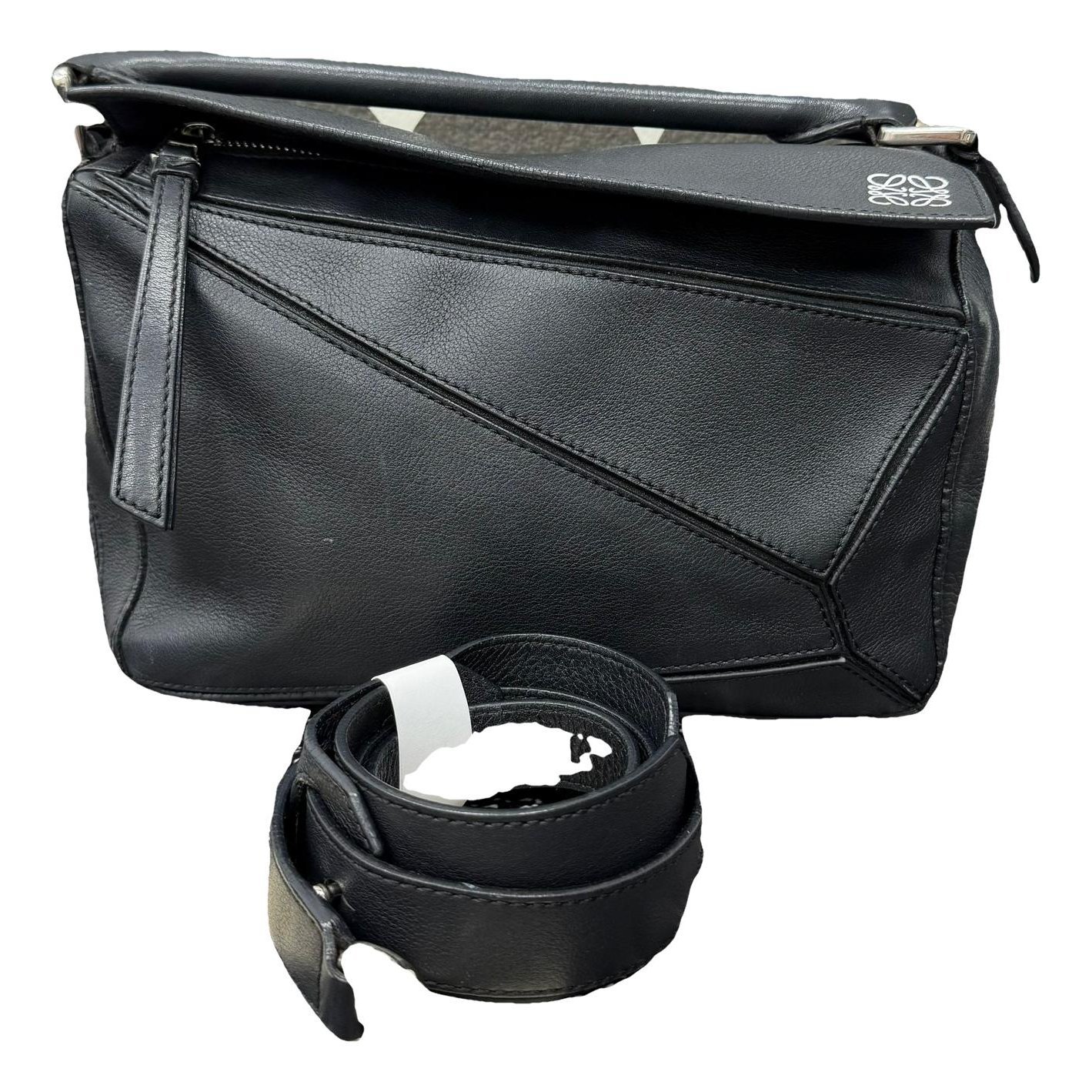 Puzzle leather handbag