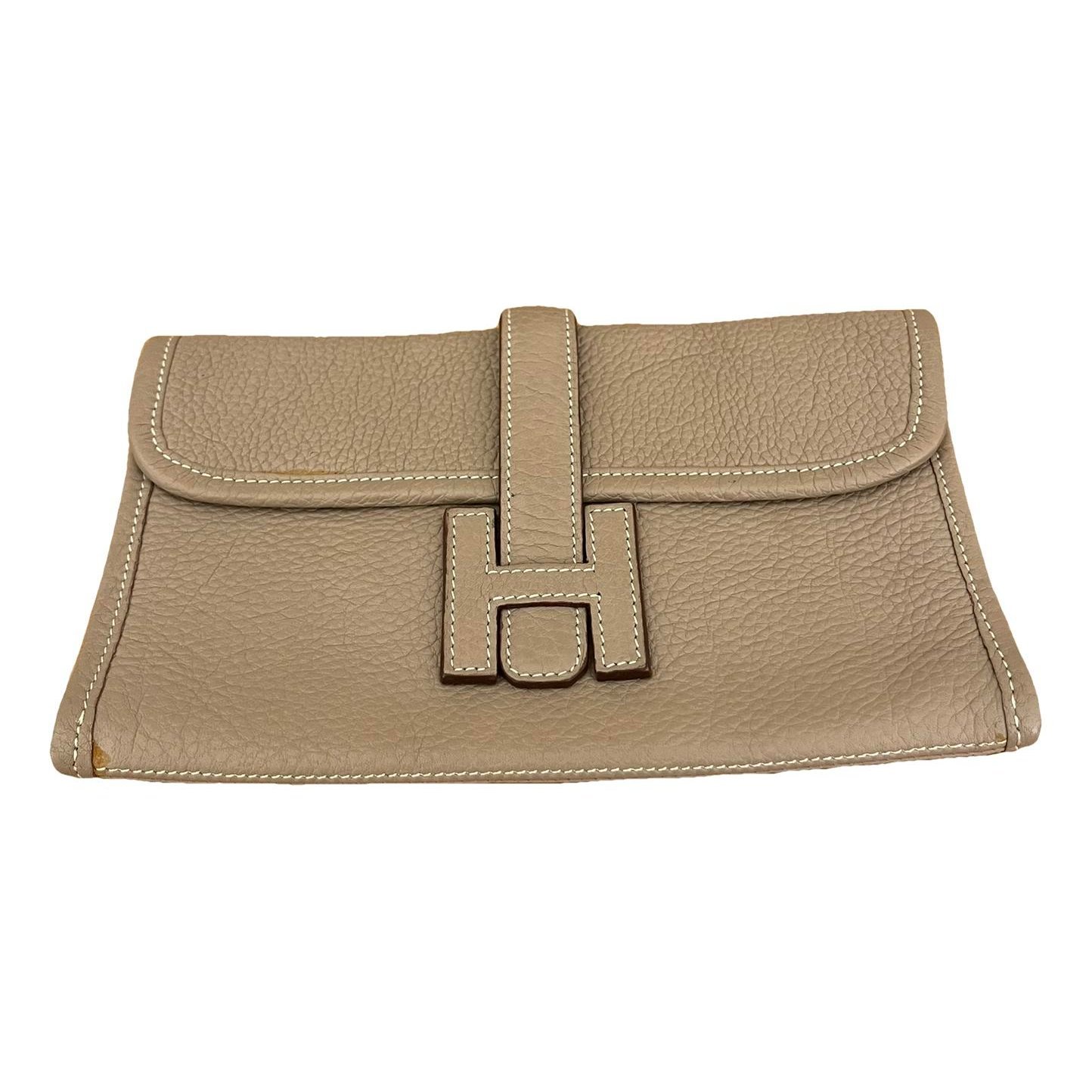 Jige leather clutch bag