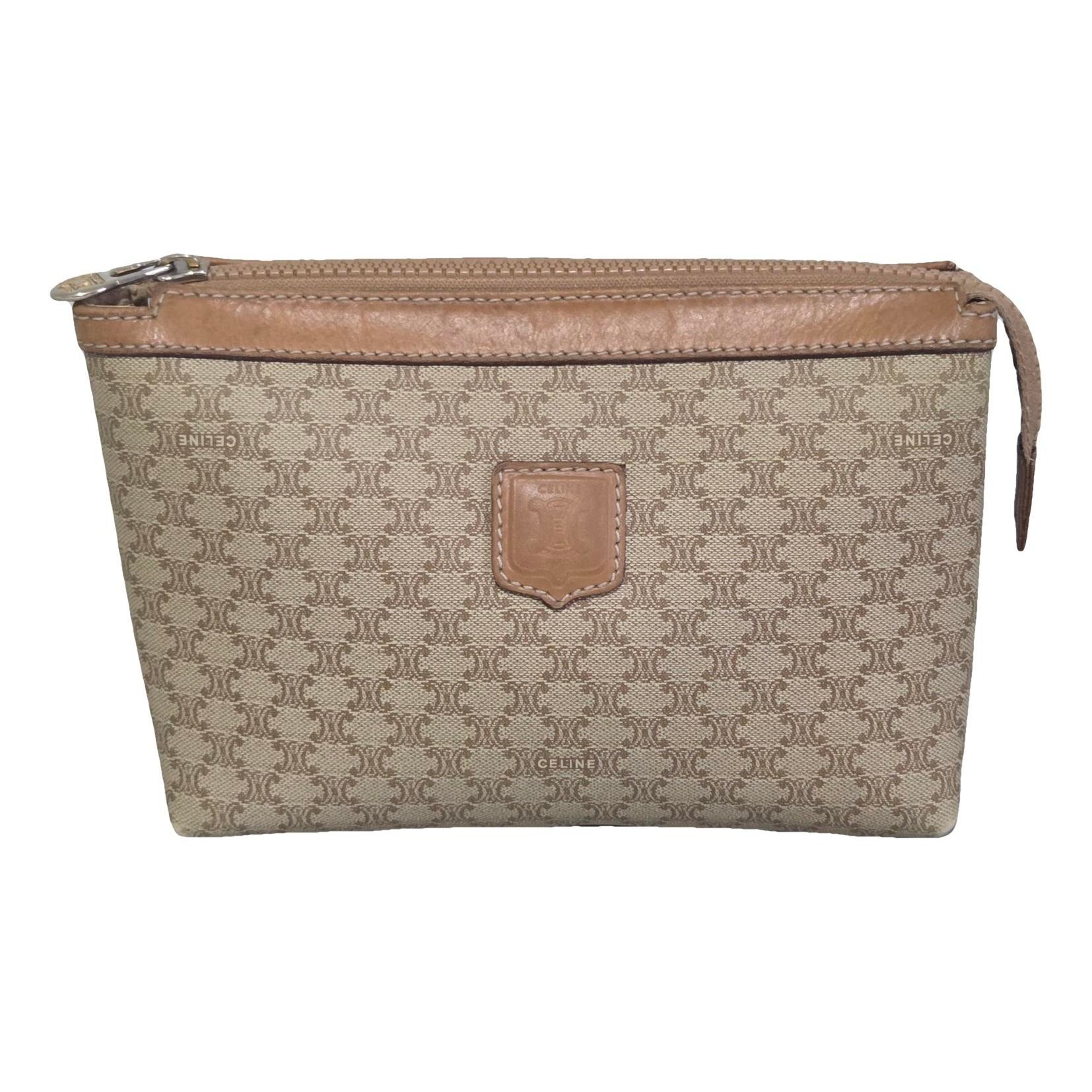 Triomphe Vintage leather clutch bag