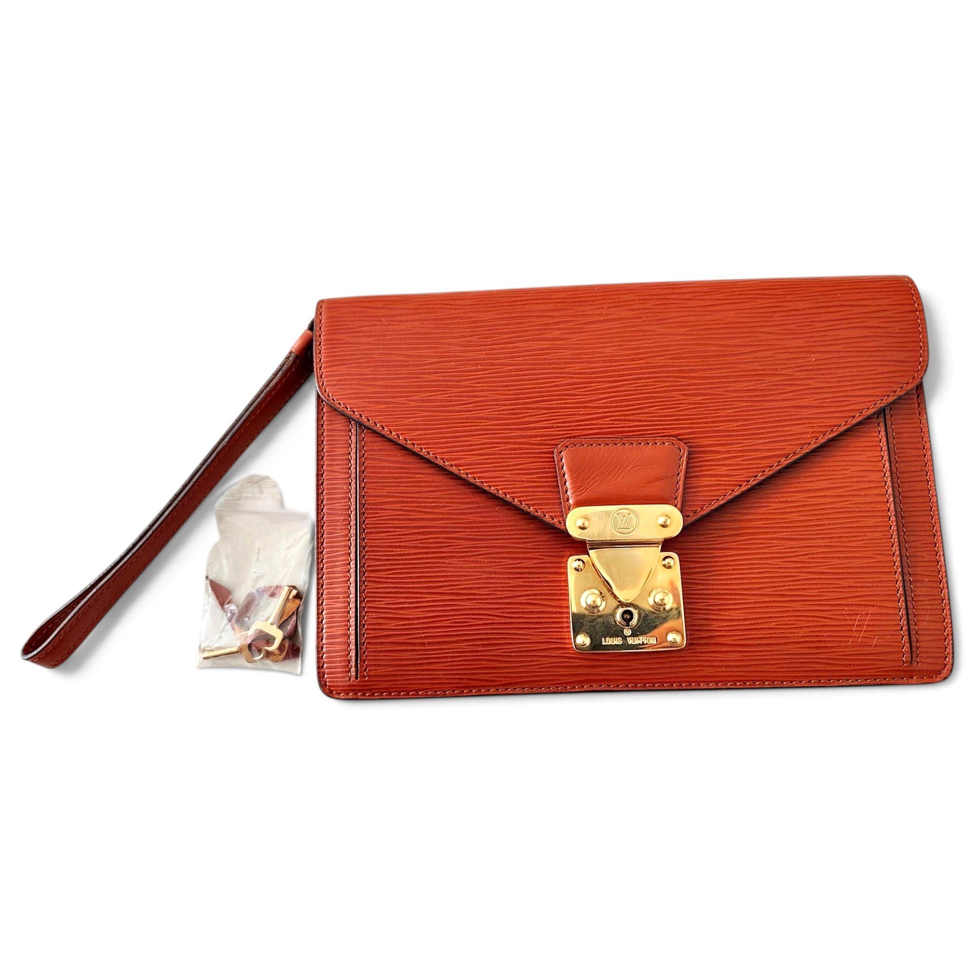 Sellier leather clutch bag