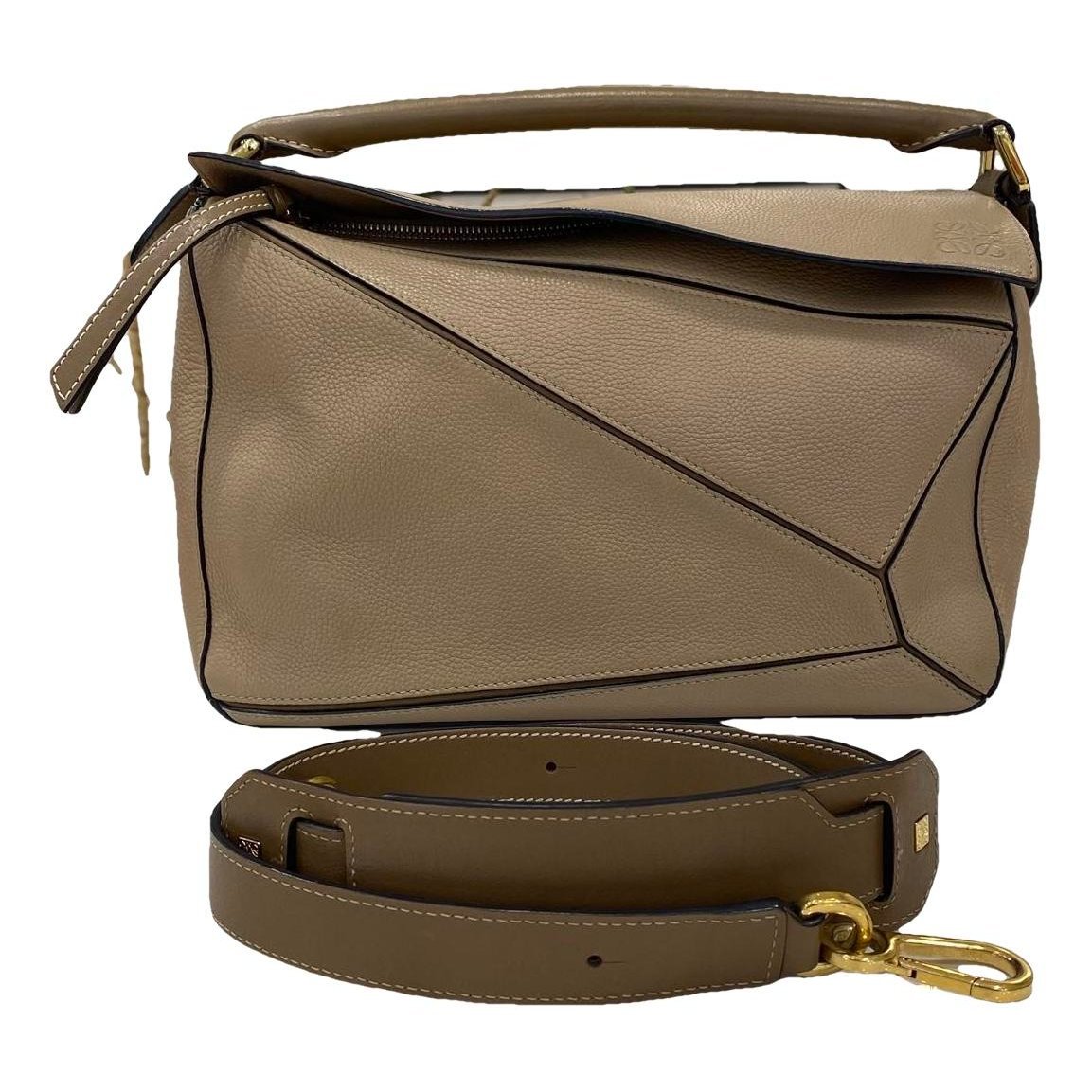 Puzzle leather handbag