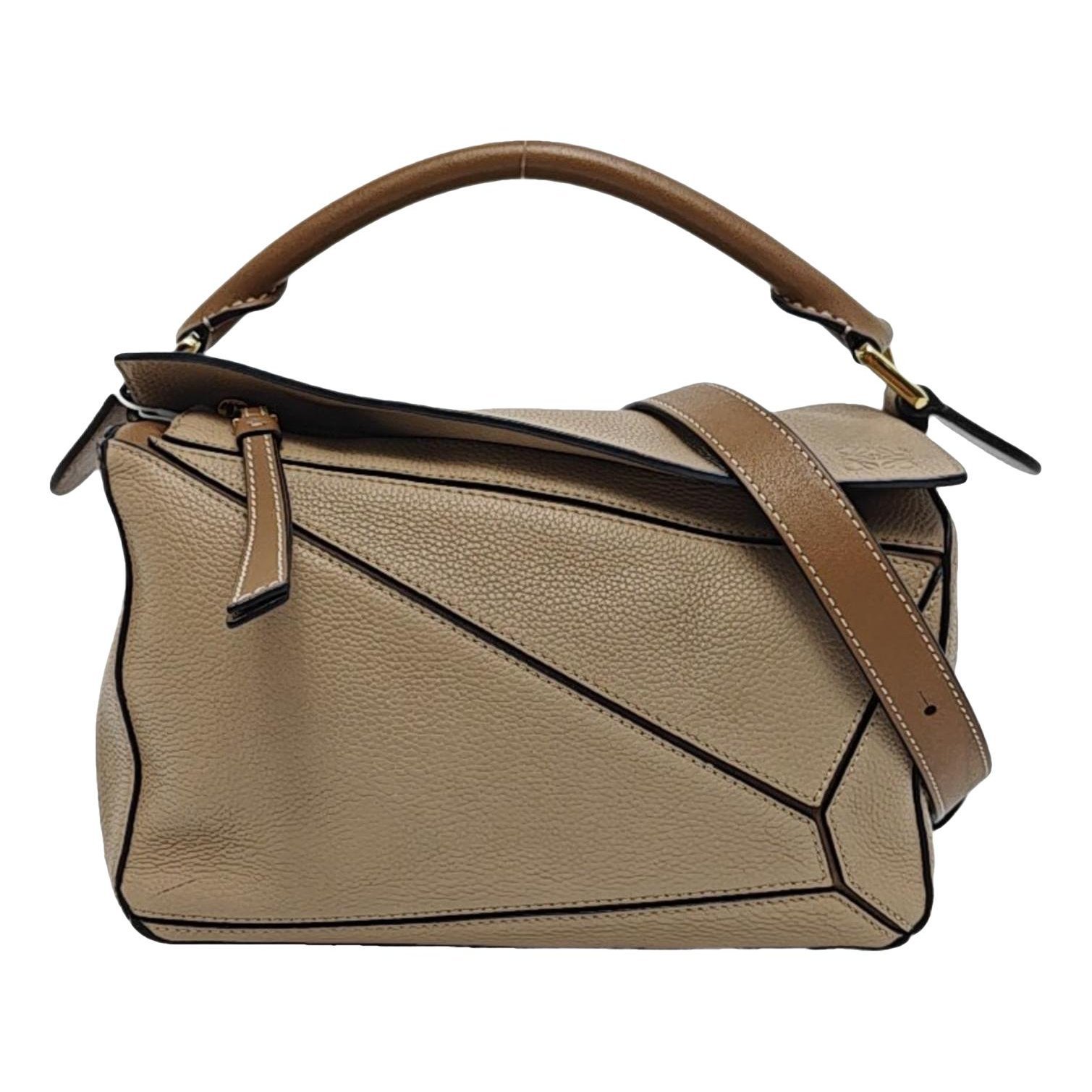 Puzzle leather handbag