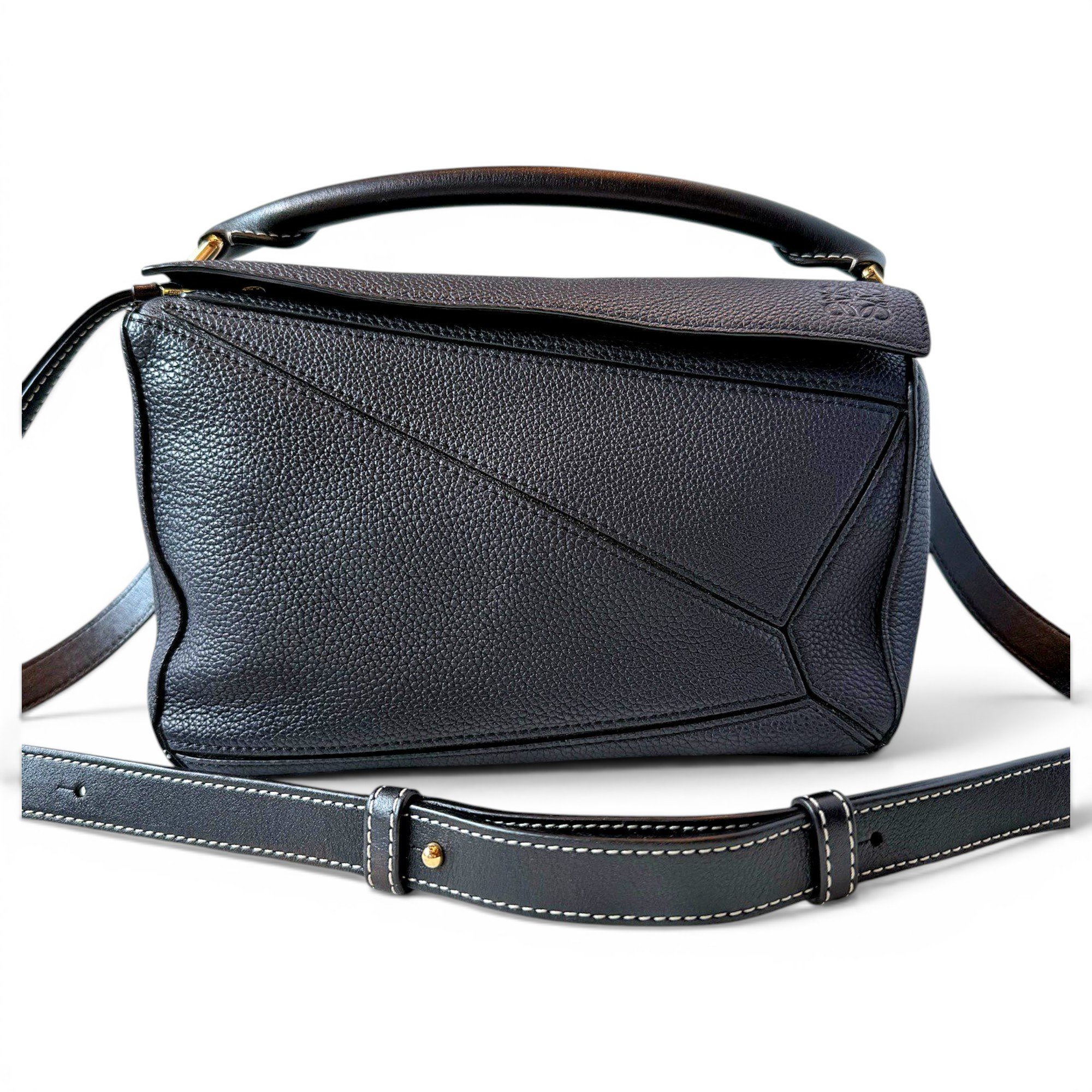 Puzzle leather handbag