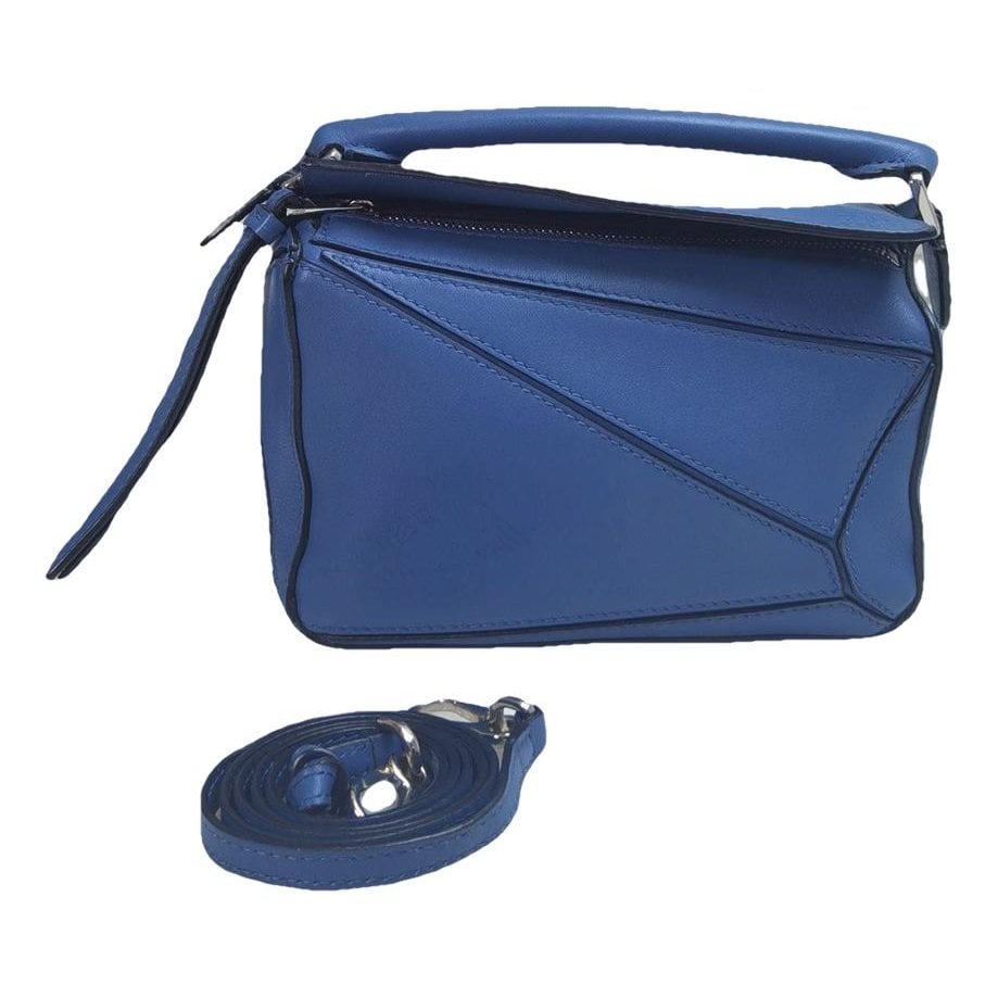 Puzzle leather handbag