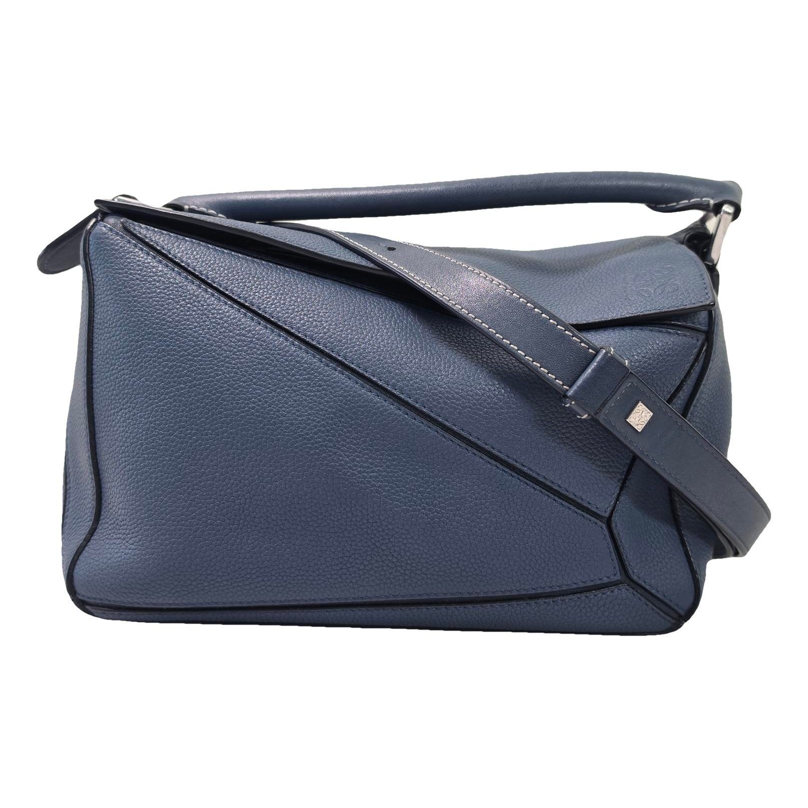 Puzzle leather handbag