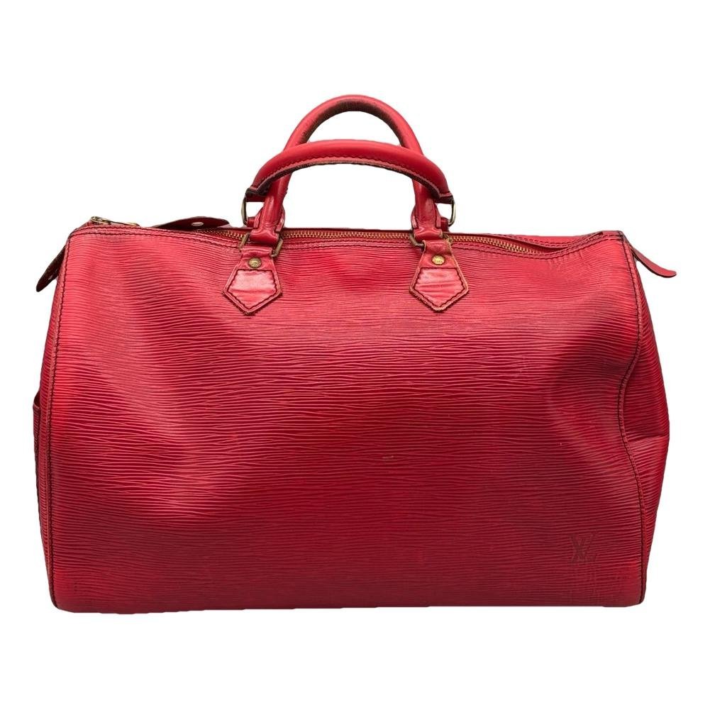 Speedy patent leather handbag