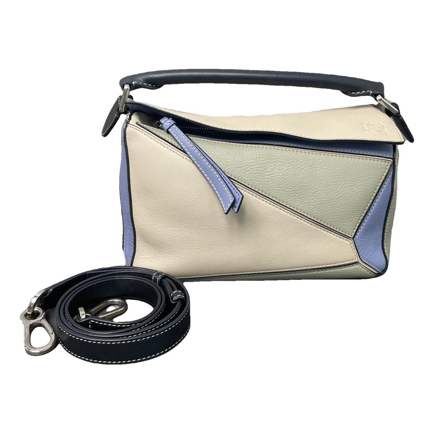 Puzzle leather handbag