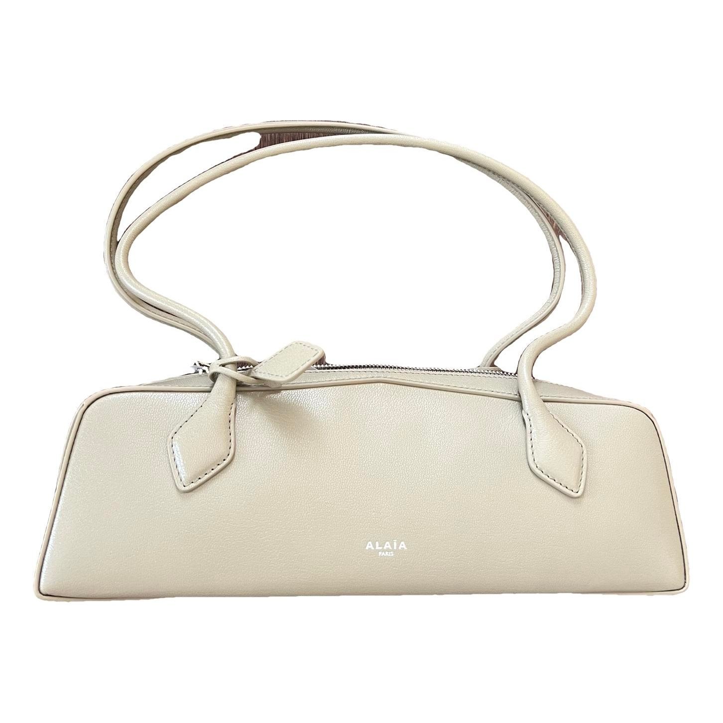 Le Teckel leather handbag