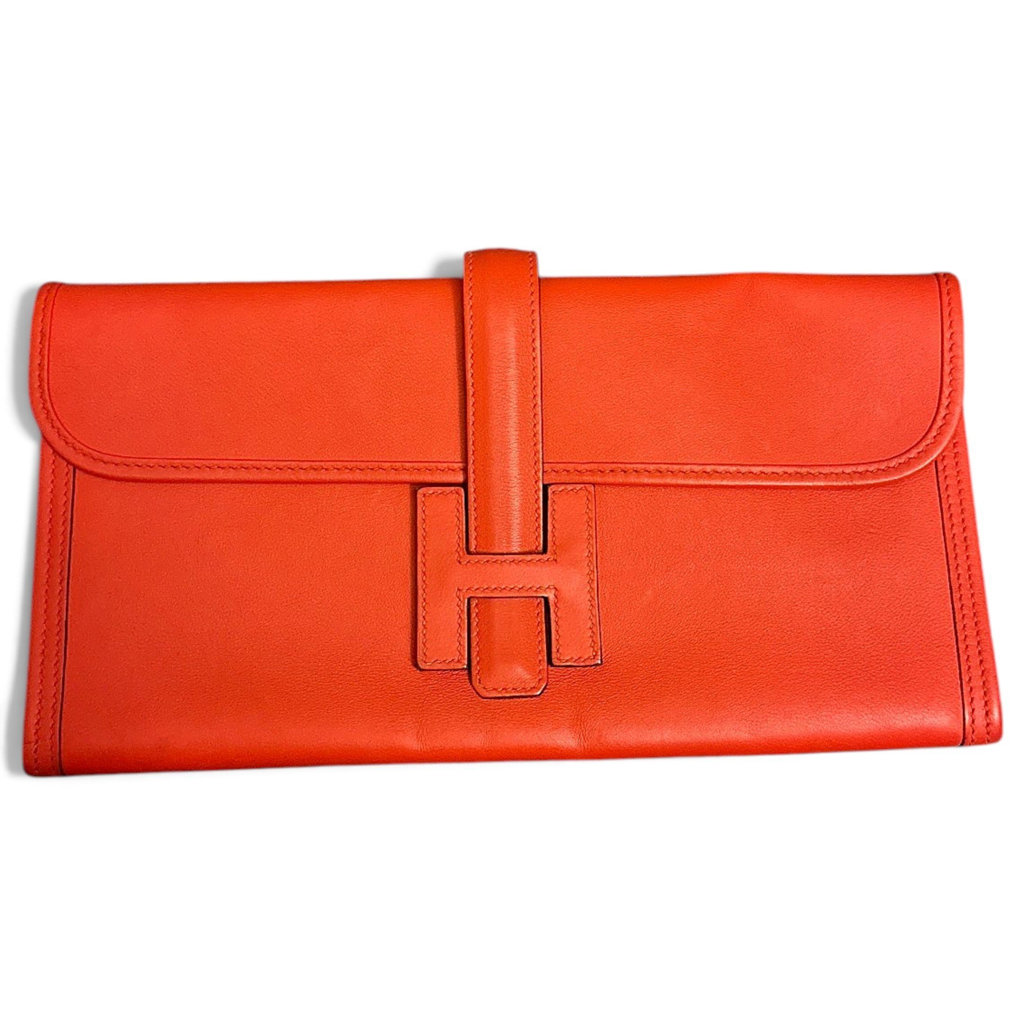 Jige leather clutch bag