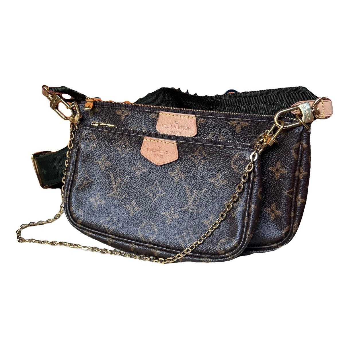 Multi Pochette Accessoires patent leather handbag