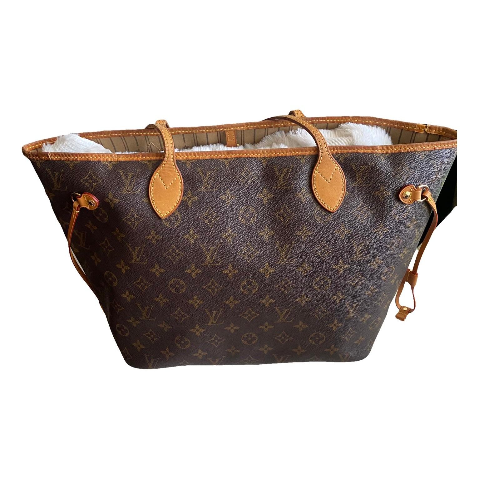 Neverfull leather clutch bag