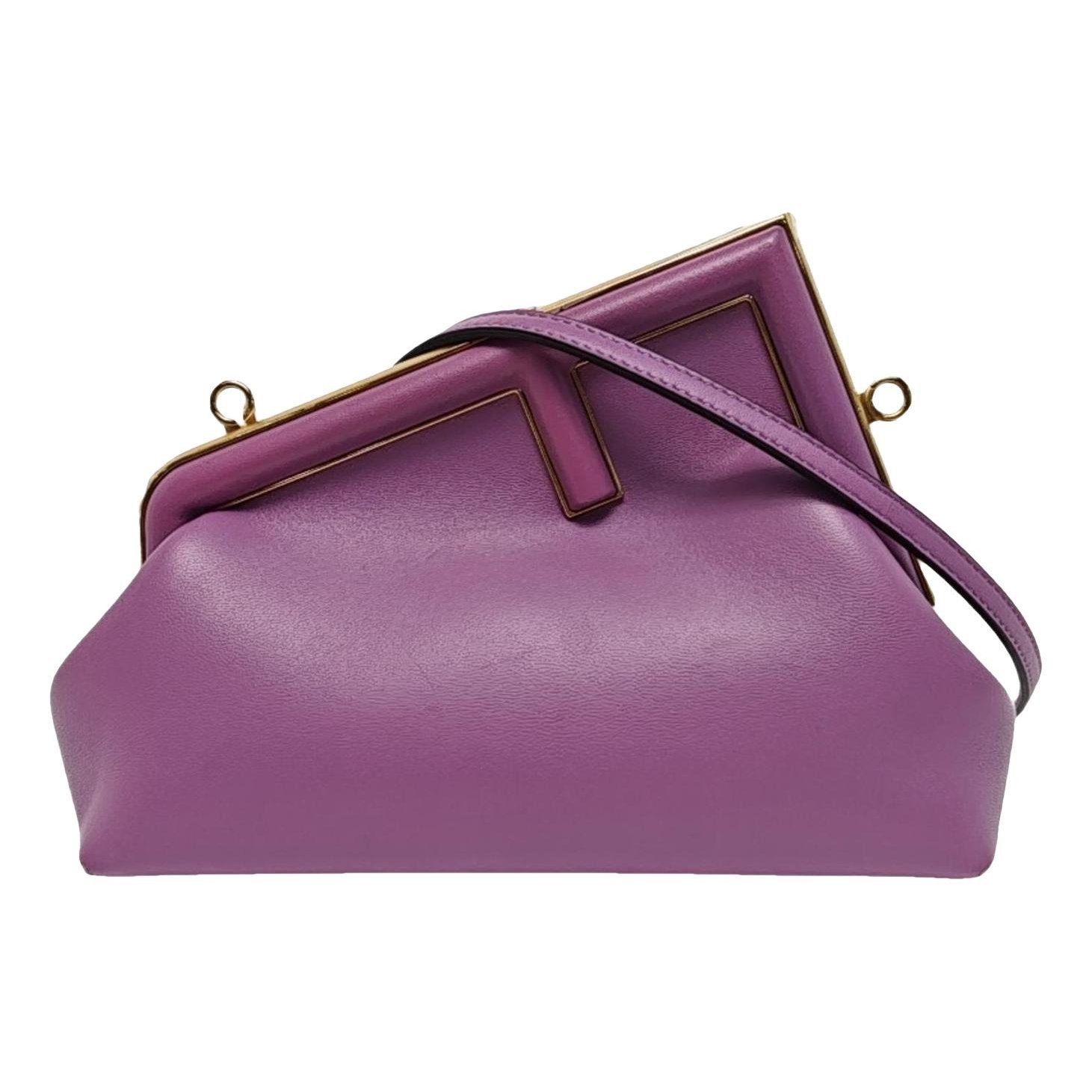 First leather handbag