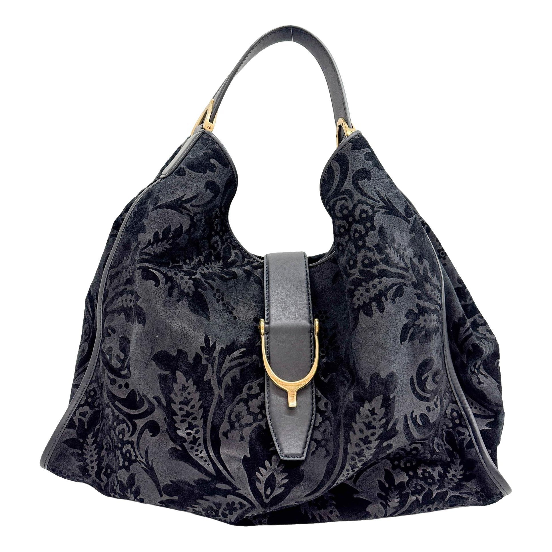 Stirrup handbag