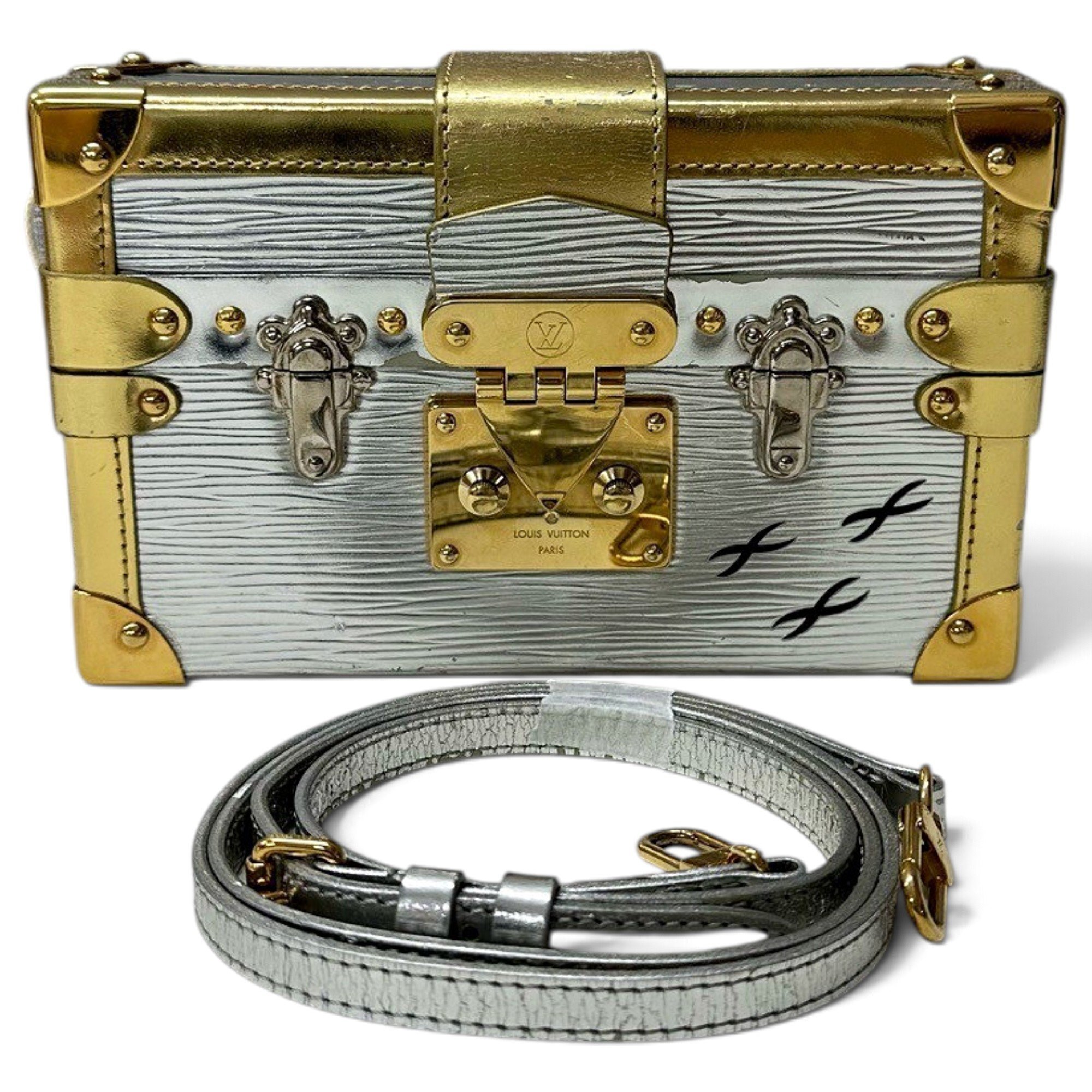 Pochette Trunk leather handbag