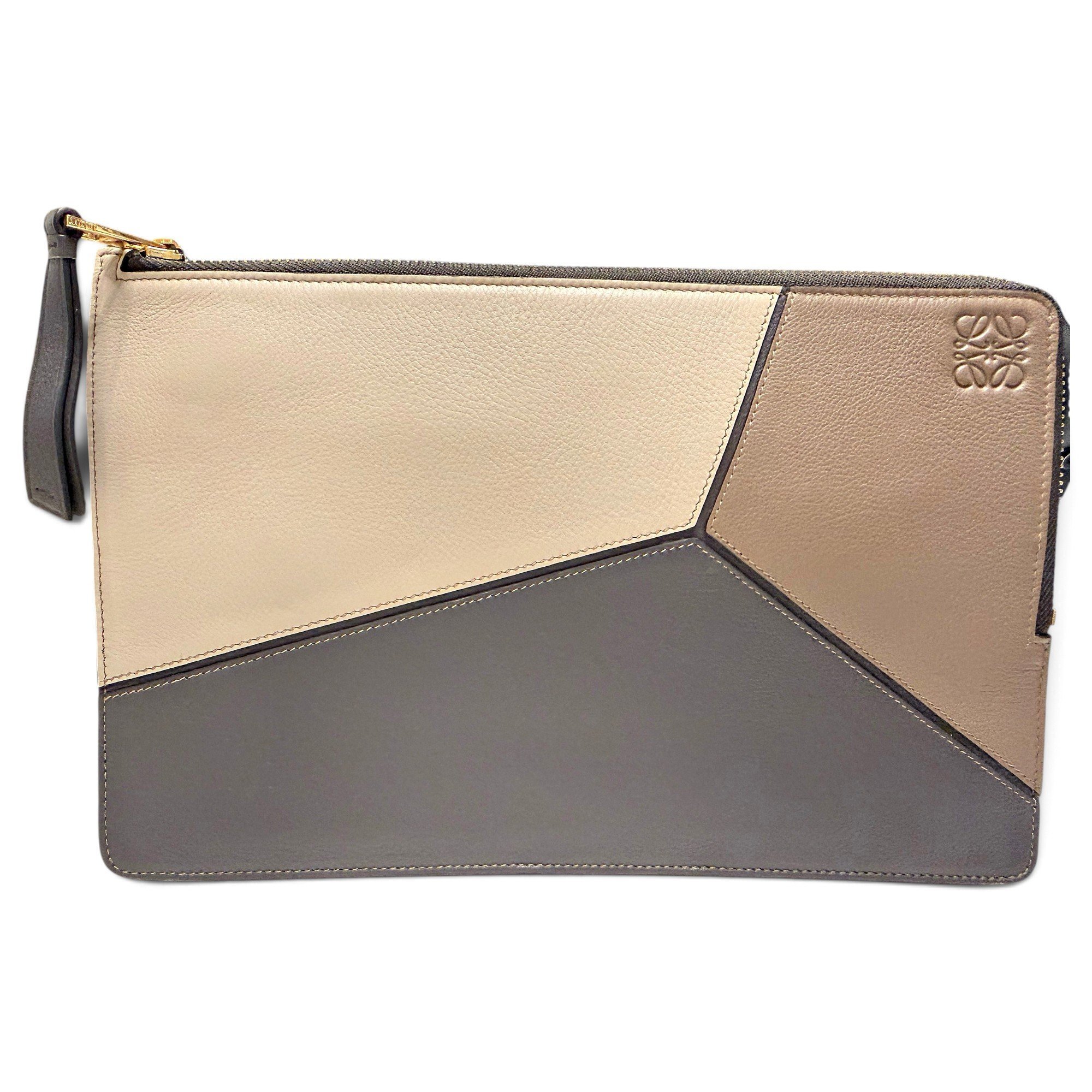 Puzzle leather clutch bag