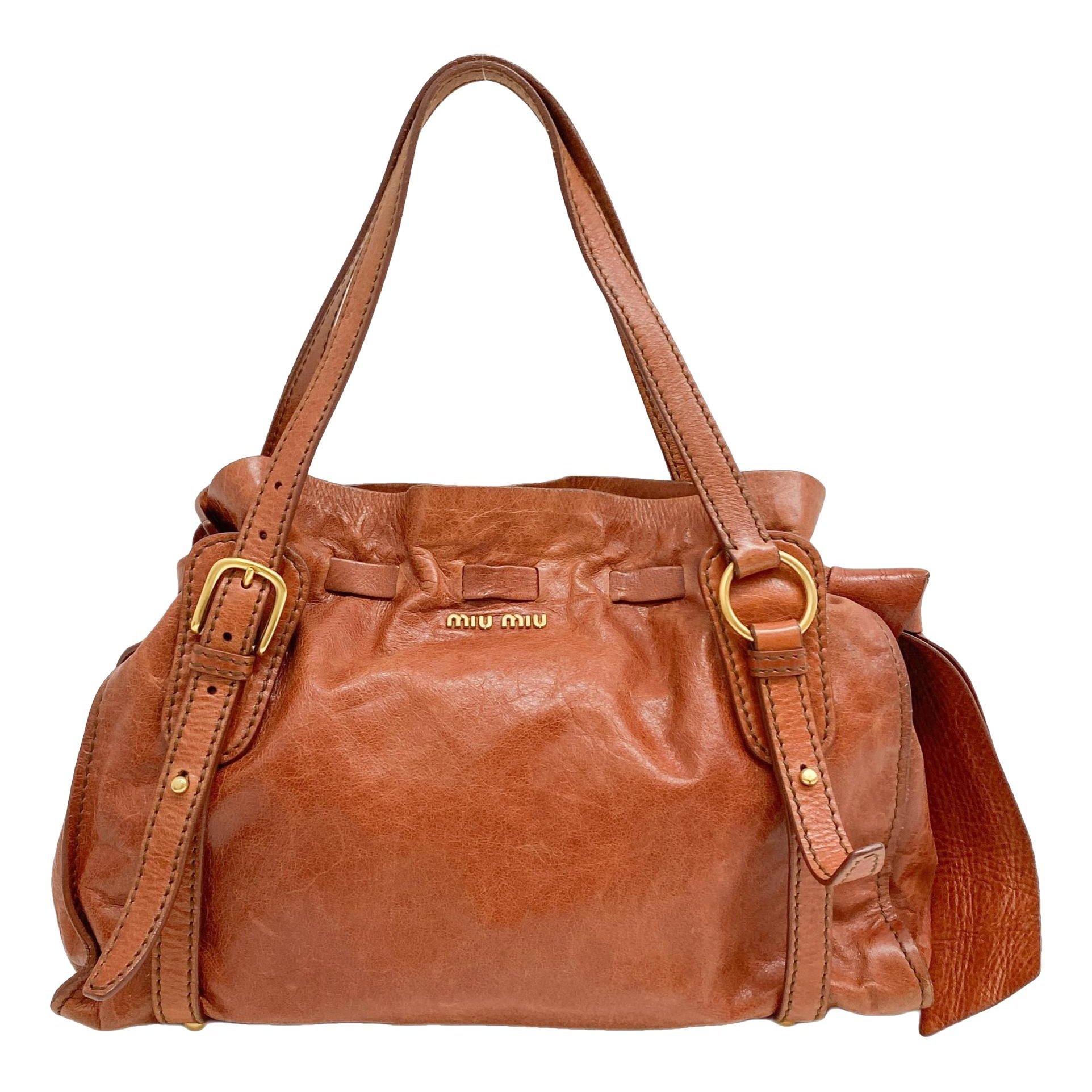 Bow bag leather handbag