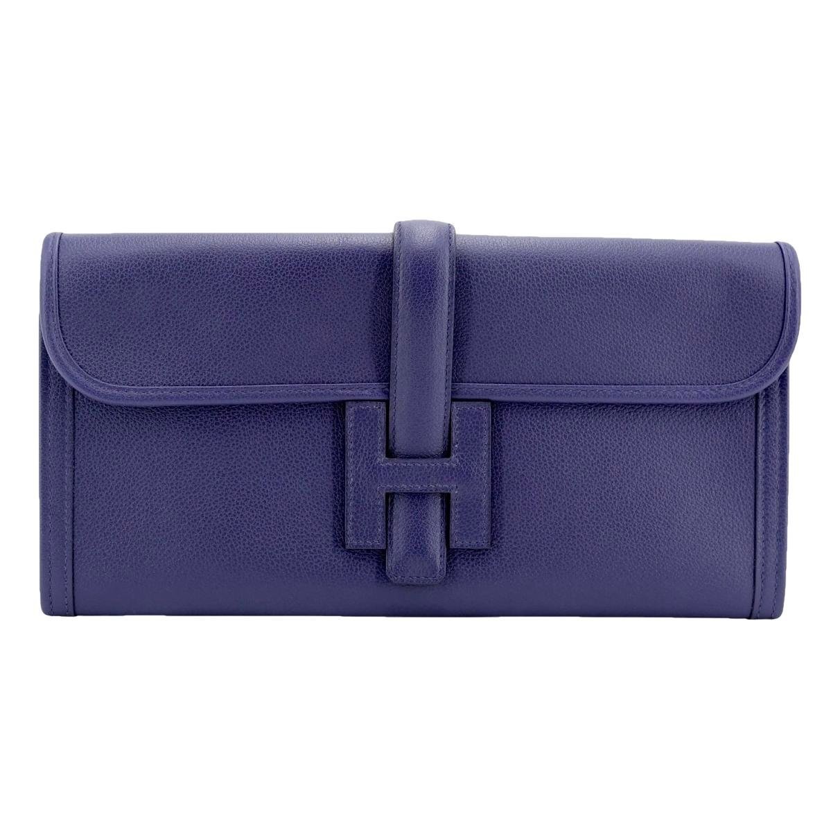 Jige leather clutch bag