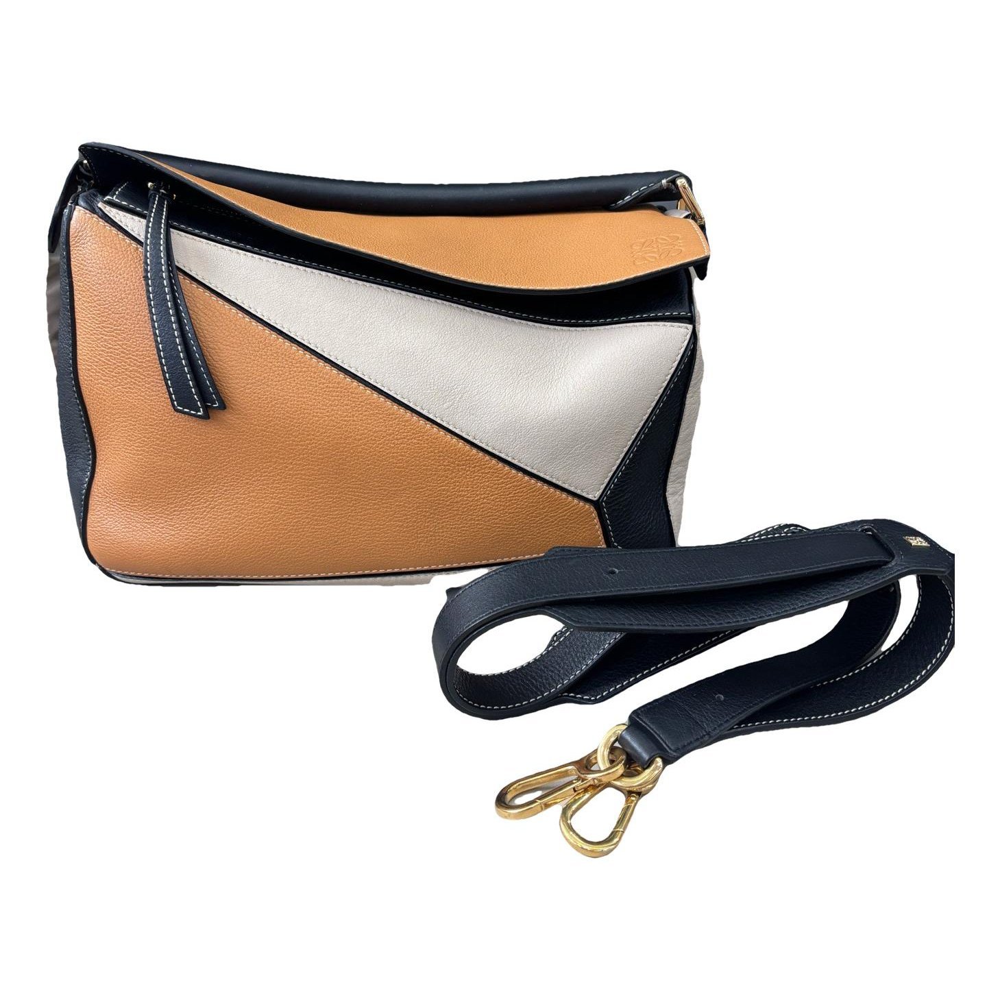 Puzzle leather handbag