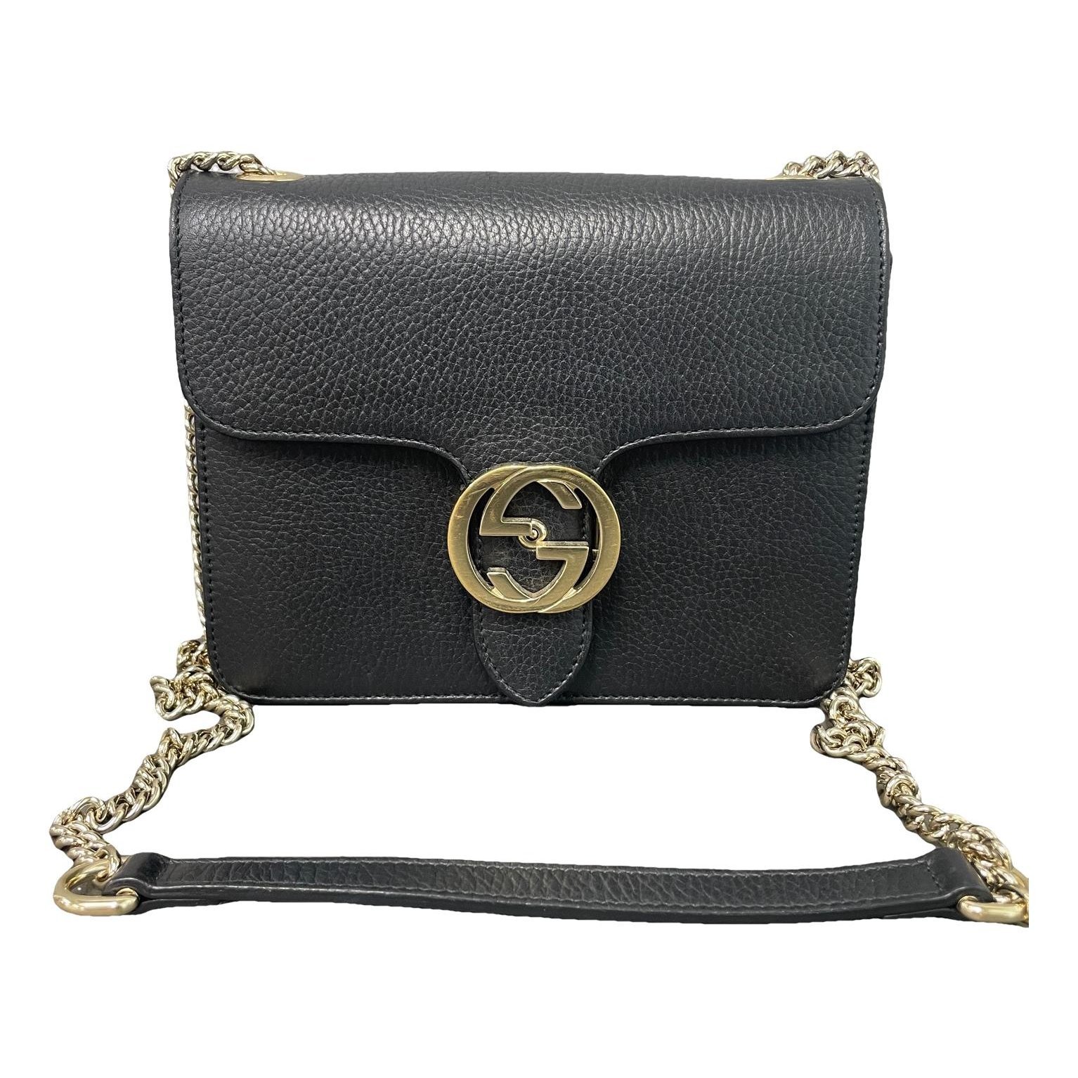 Interlocking leather handbag