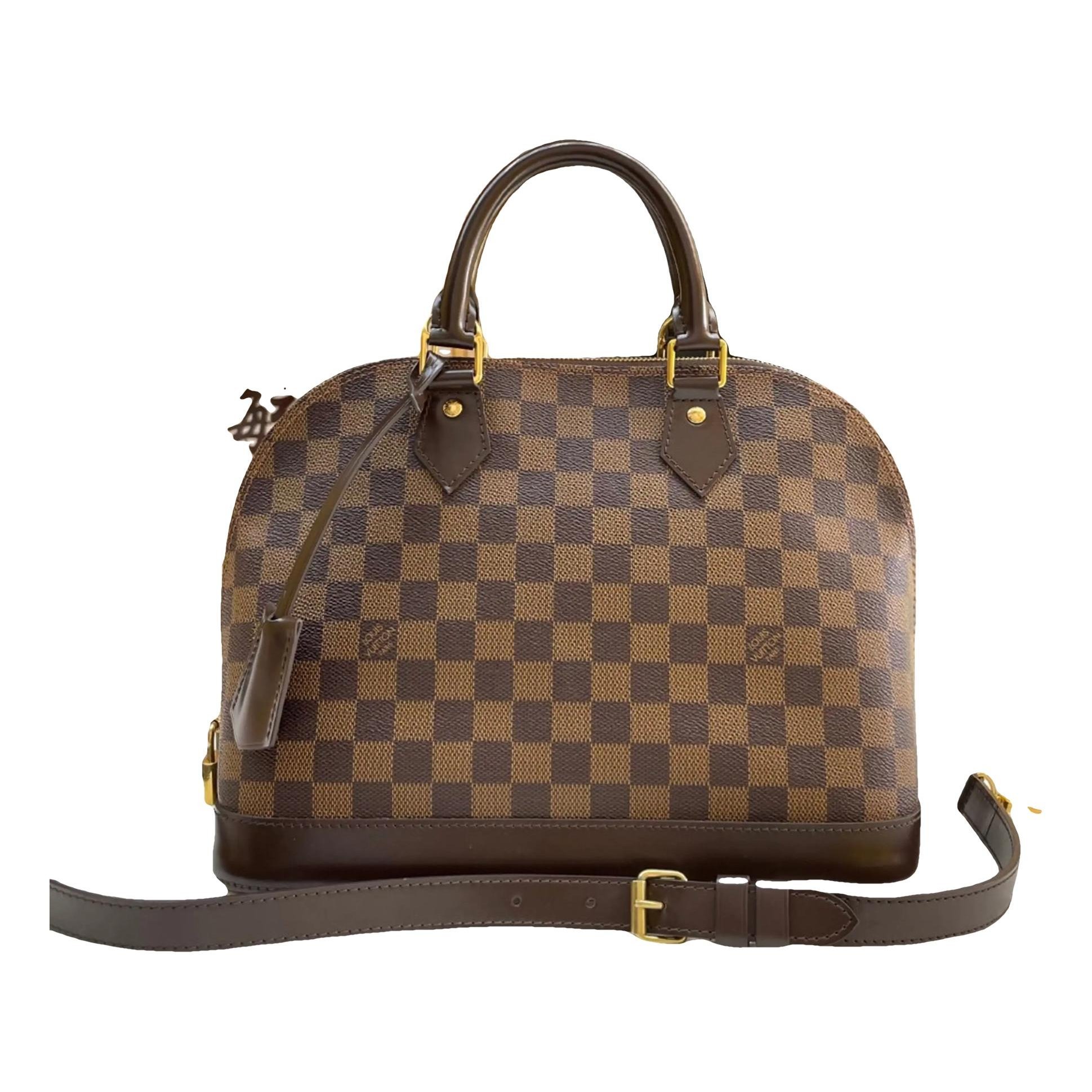 Alma vinyl handbag