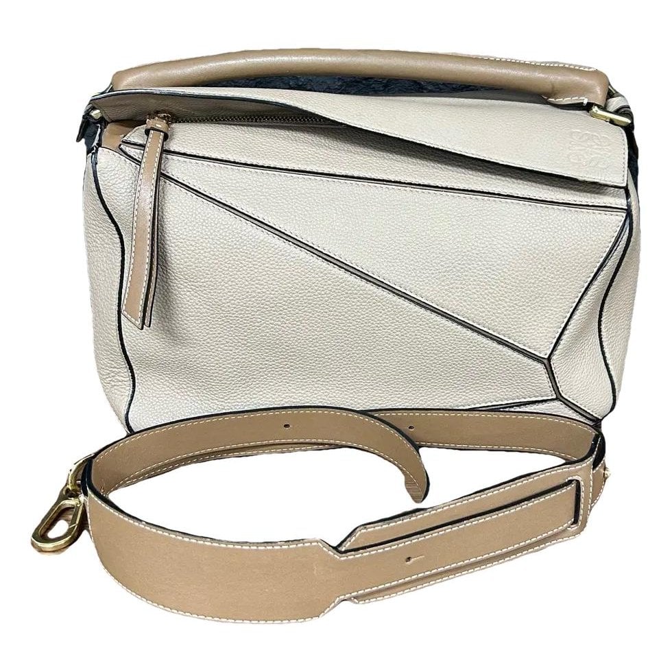 Puzzle leather handbag