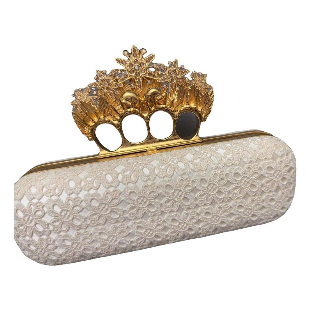 Knuckle leather clutch bag