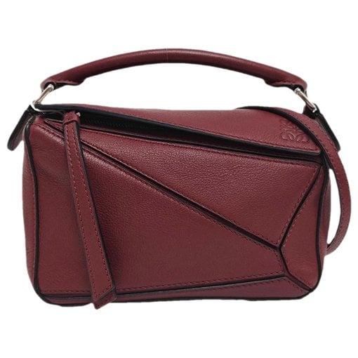 Puzzle leather handbag