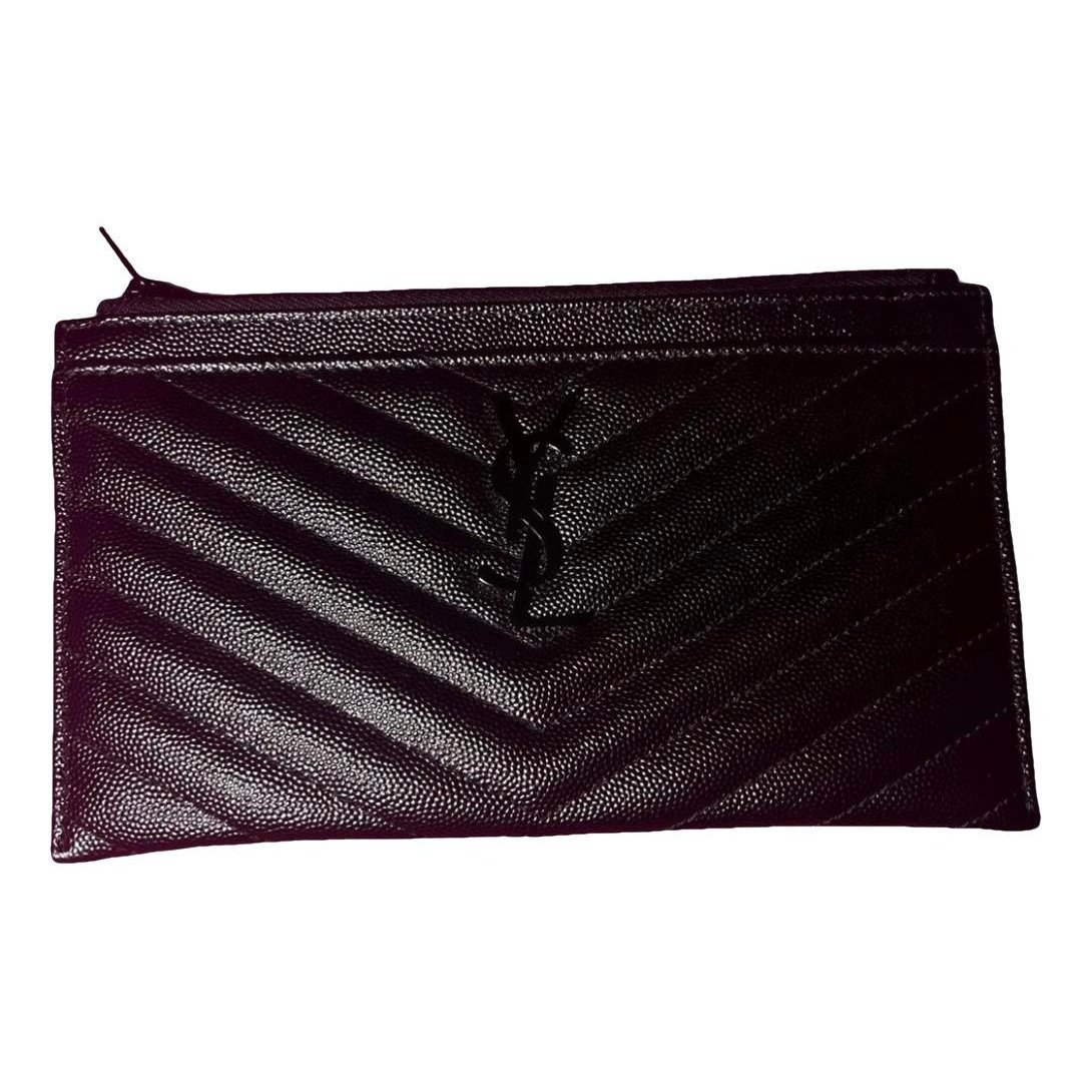 Cassandre leather clutch bag