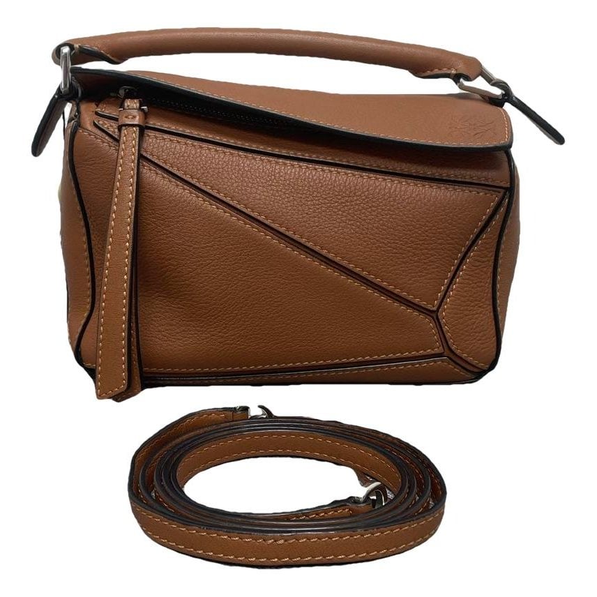 Puzzle leather handbag