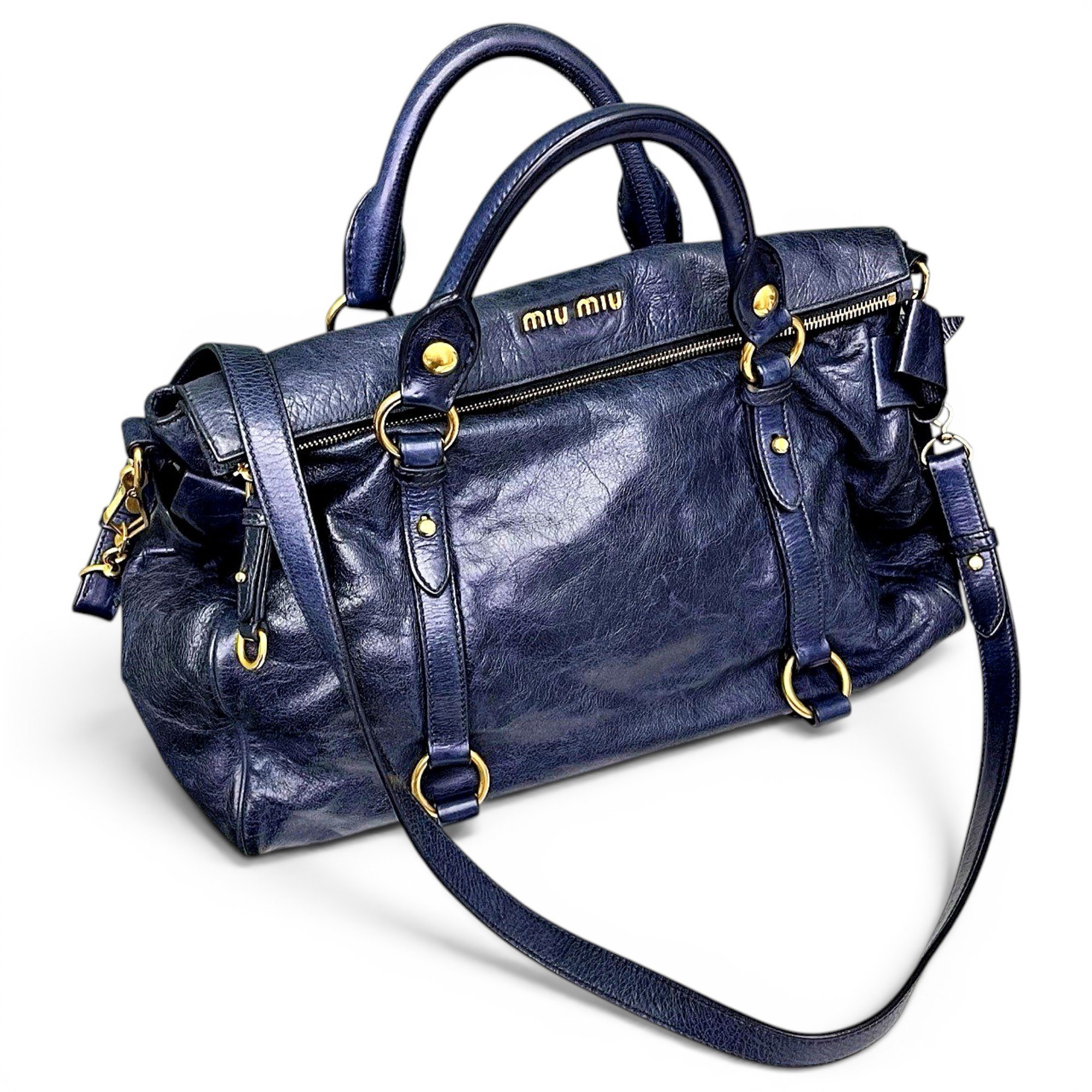 Bow bag leather handbag