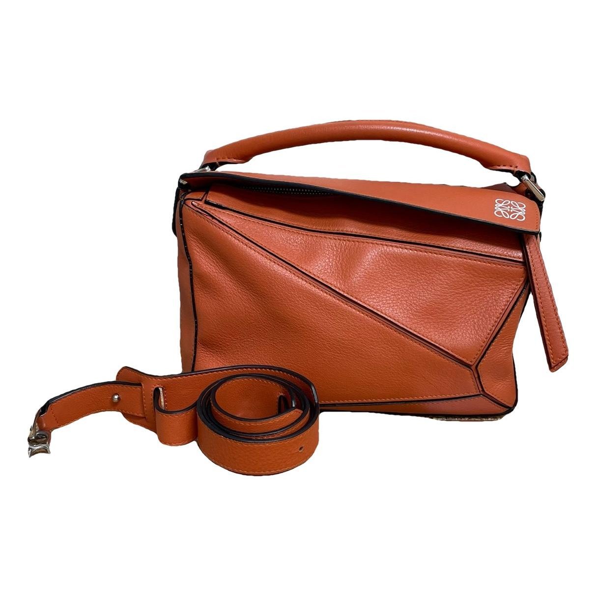 Puzzle leather handbag