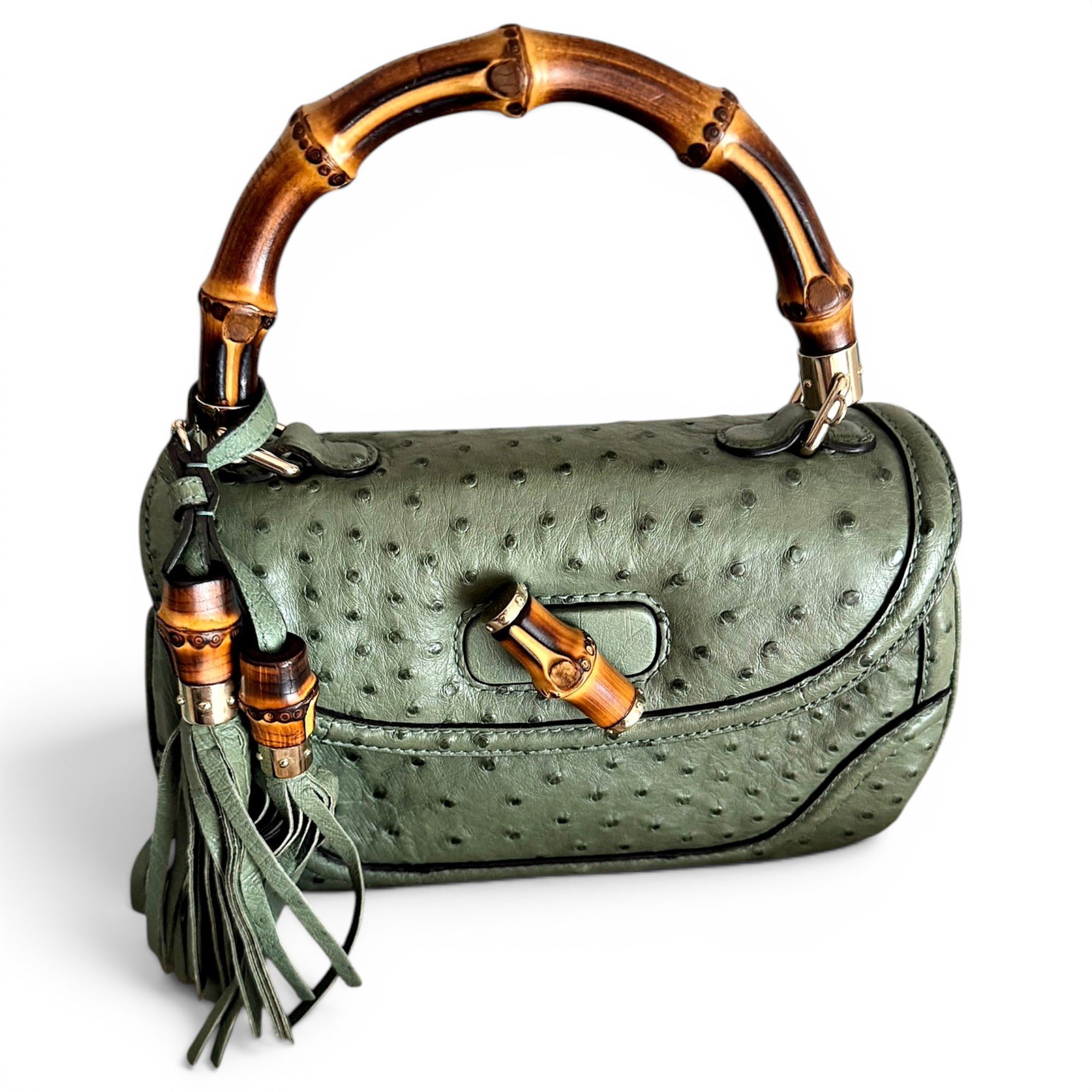 Convertible Pompon Bamboo Top Handle leather handbag