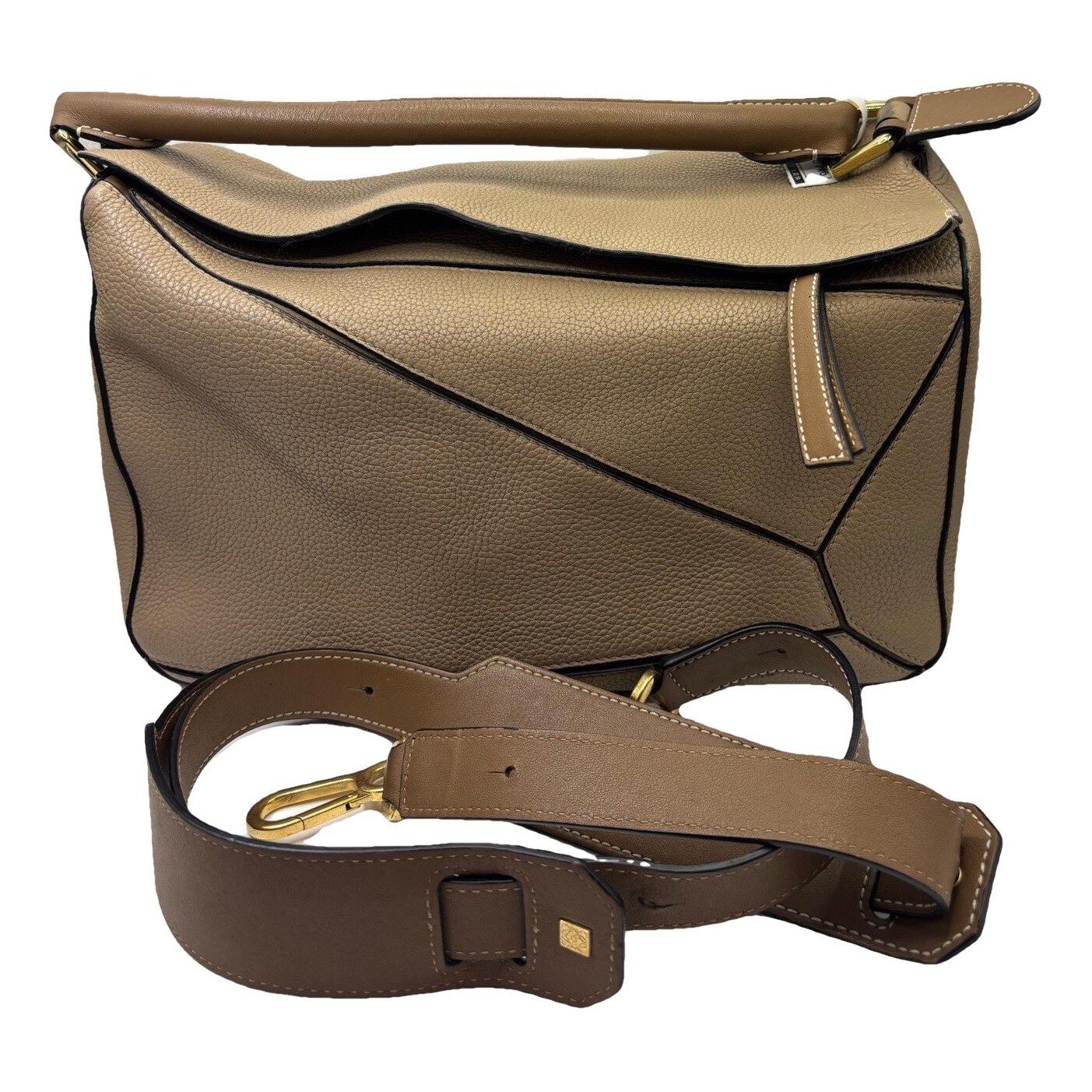 Puzzle leather handbag