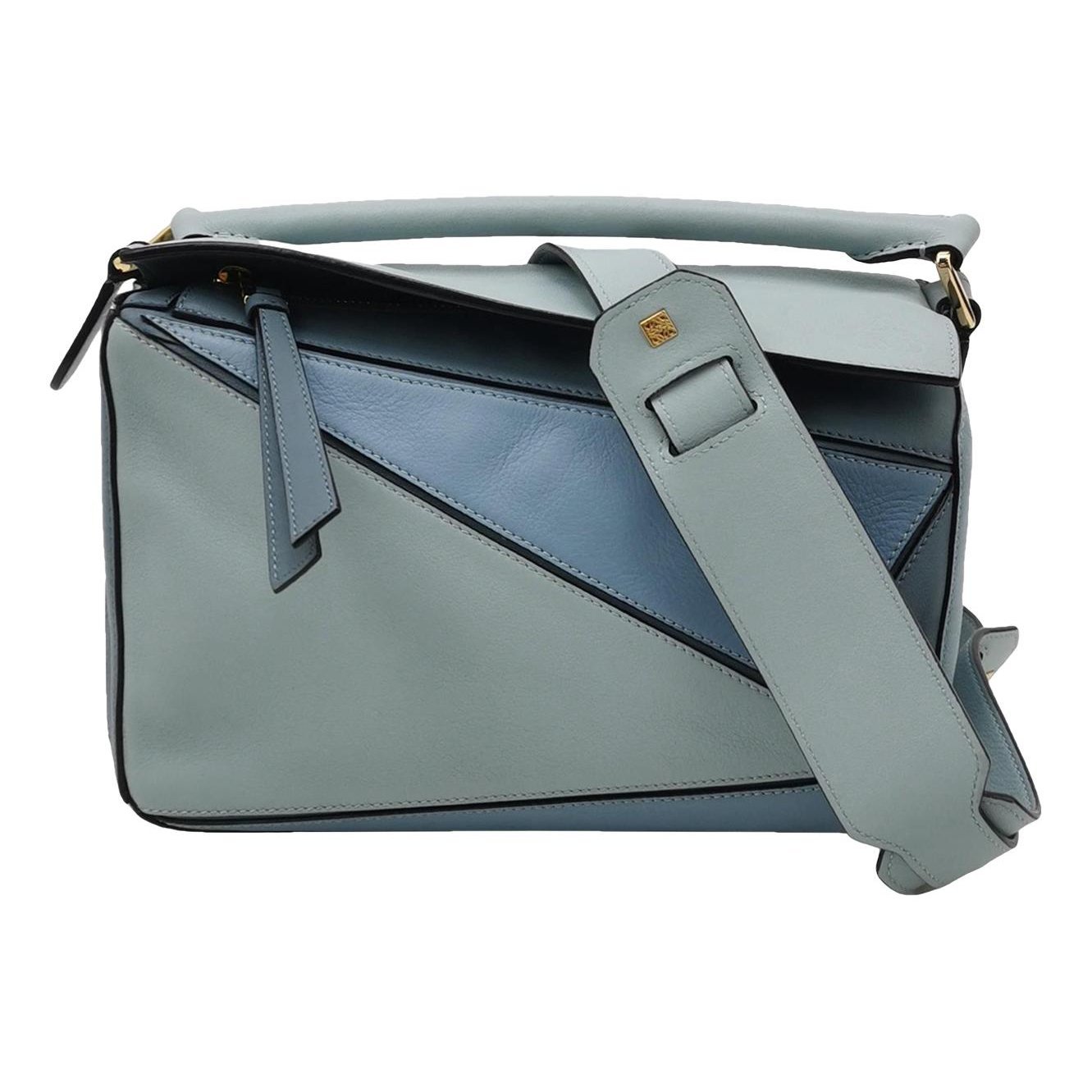 Puzzle leather handbag