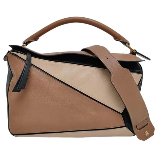Puzzle leather handbag
