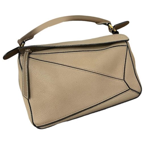 Puzzle leather handbag