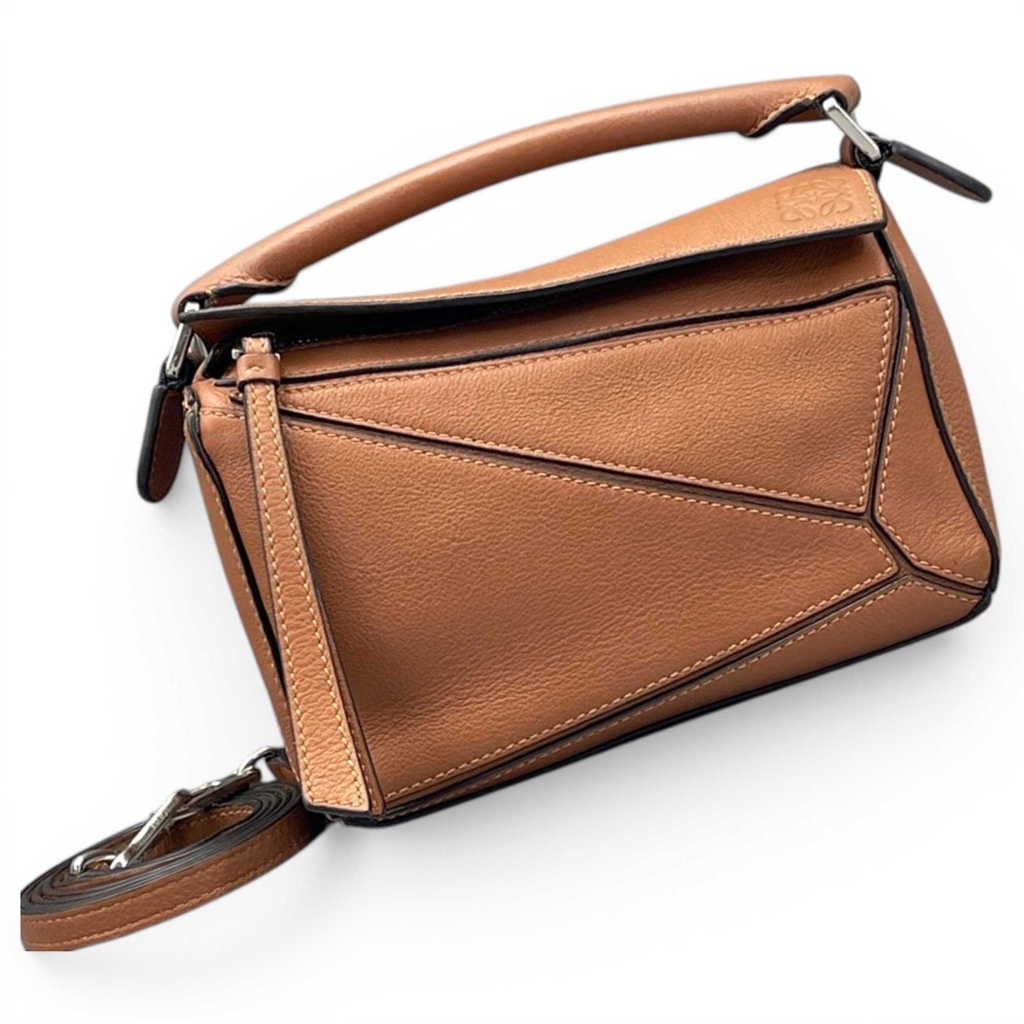 Puzzle leather handbag
