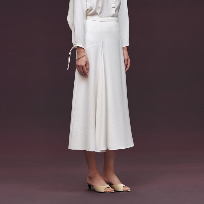 Blanc Cassé "H Kelly" Flared Asymmetric Skirt