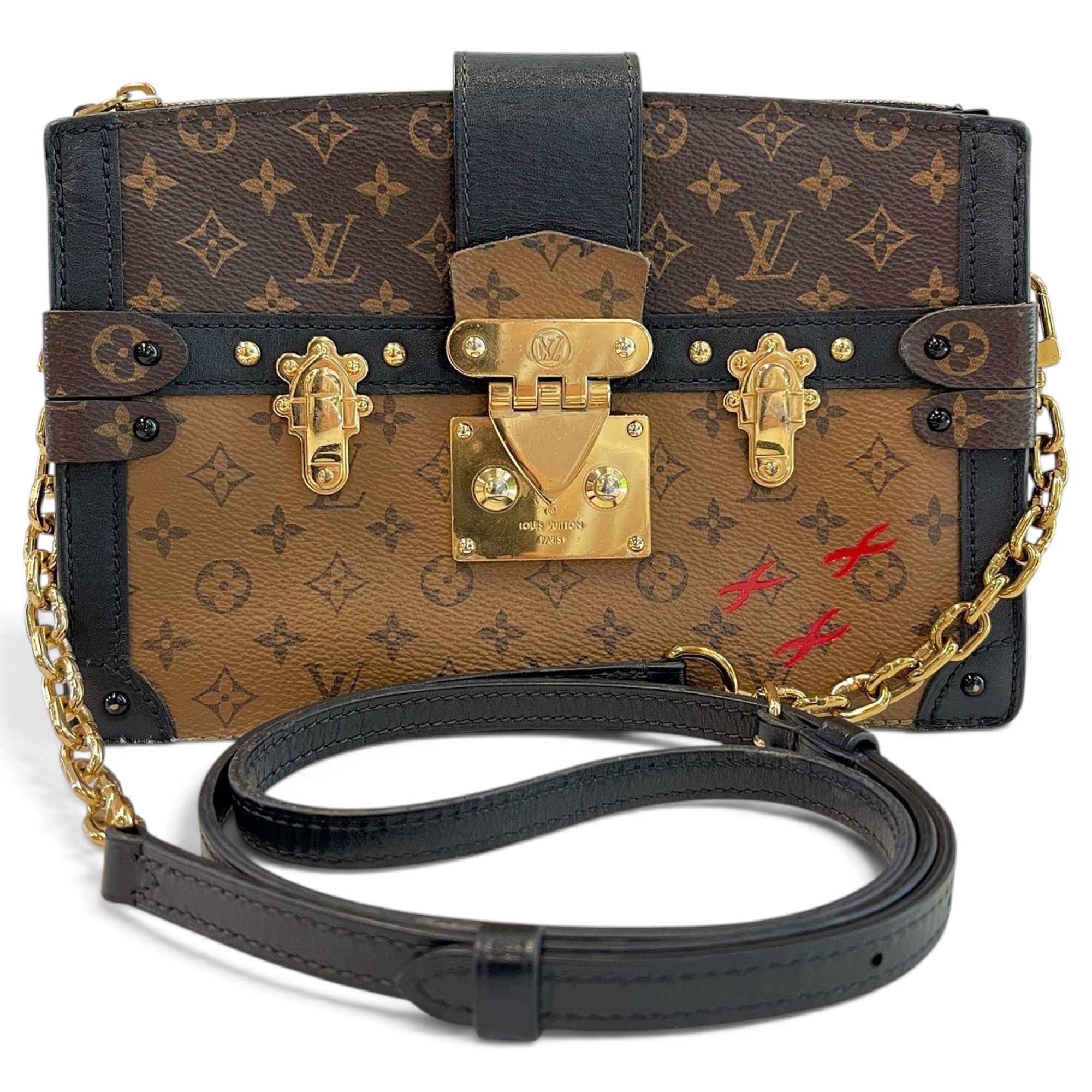 Pochette Trunk leather handbag