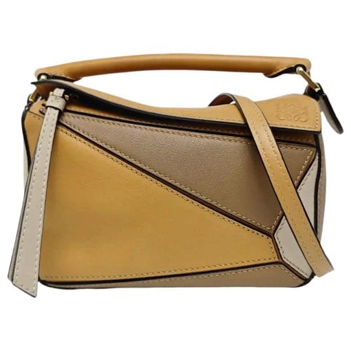 Puzzle leather handbag