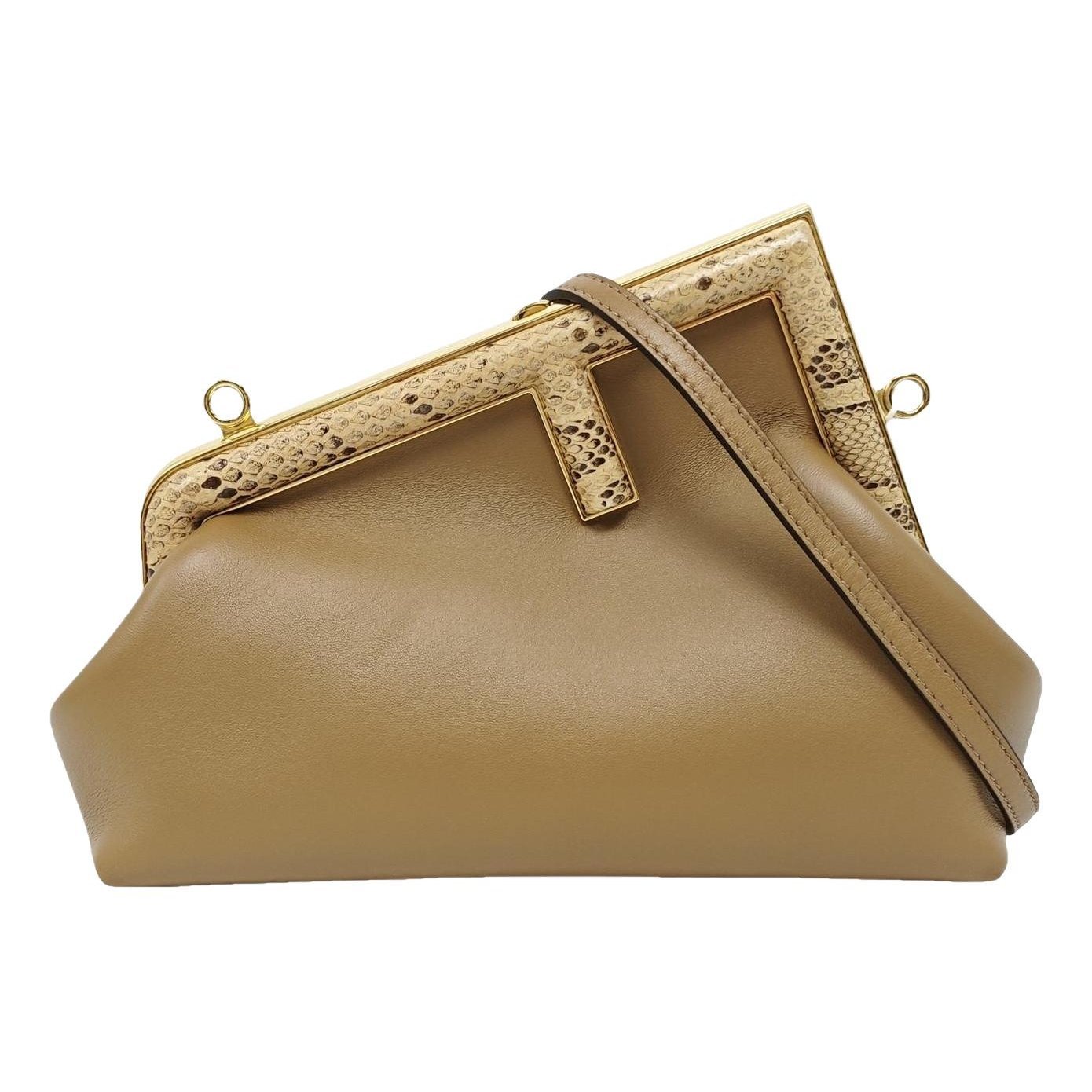 First leather handbag