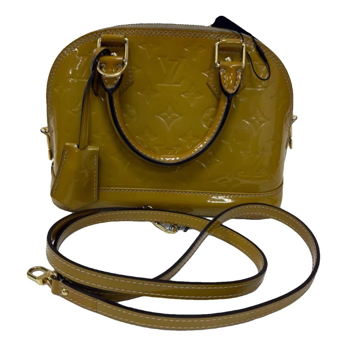 Louis Vuitton Alma BB patent leather handbag