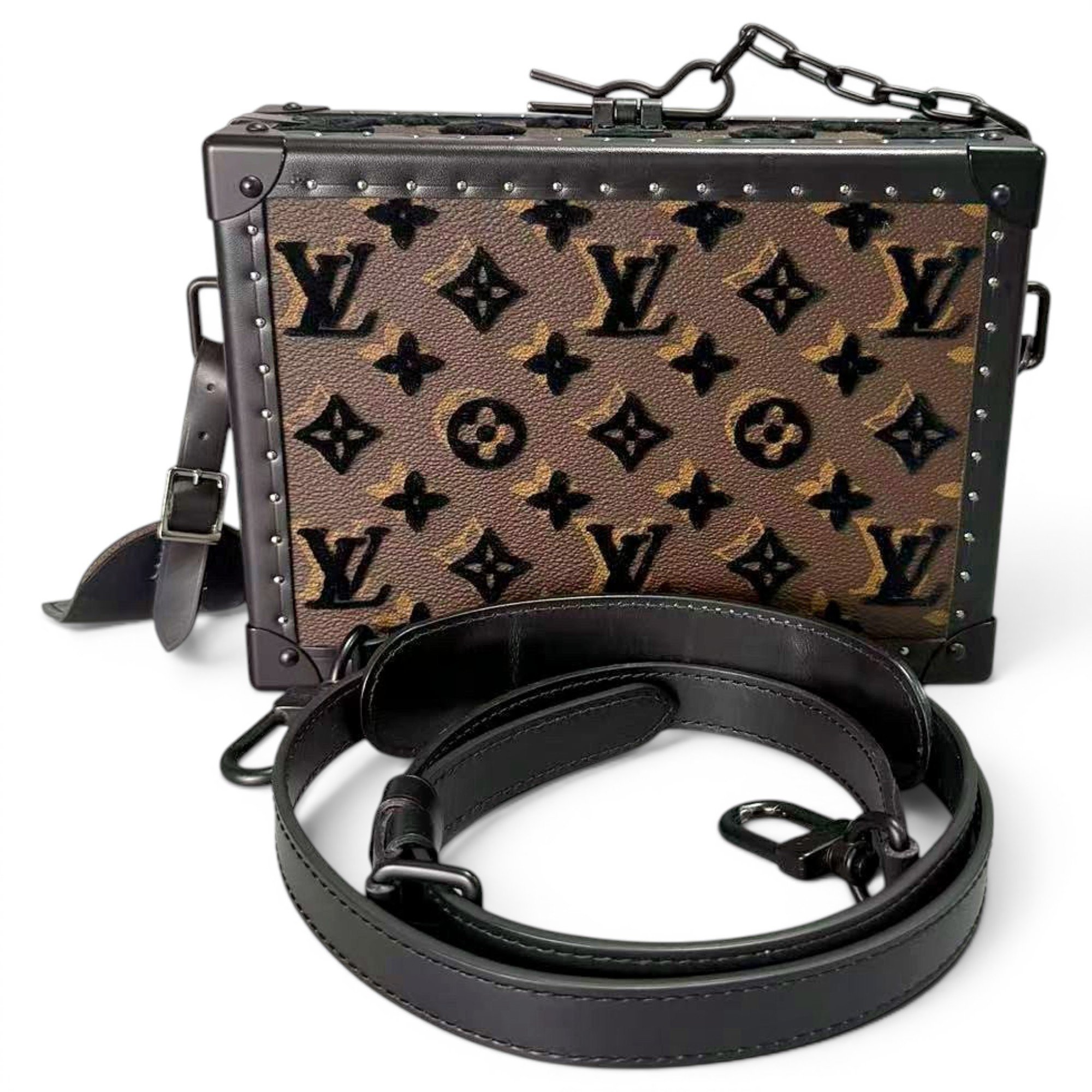 Pochette Trunk leather handbag