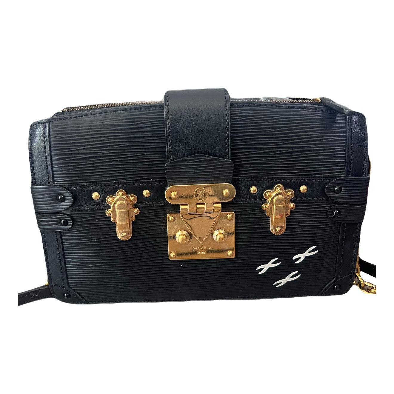 Pochette Trunk leather handbag