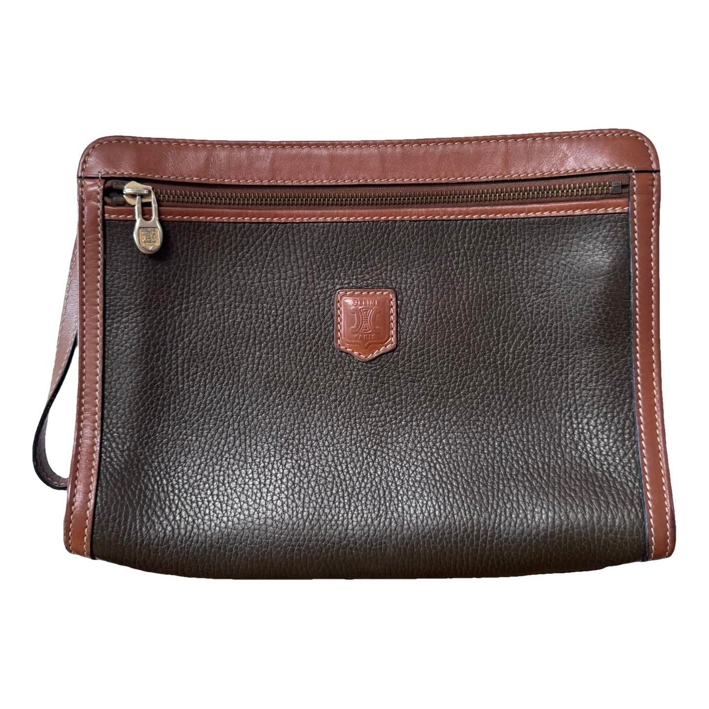 Triomphe Vintage leather clutch bag