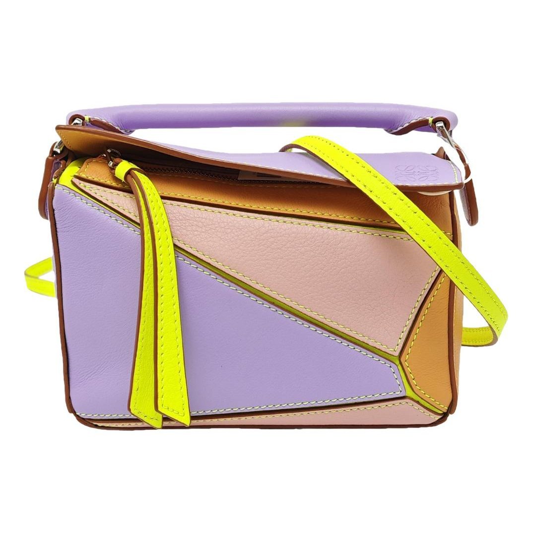Puzzle leather handbag